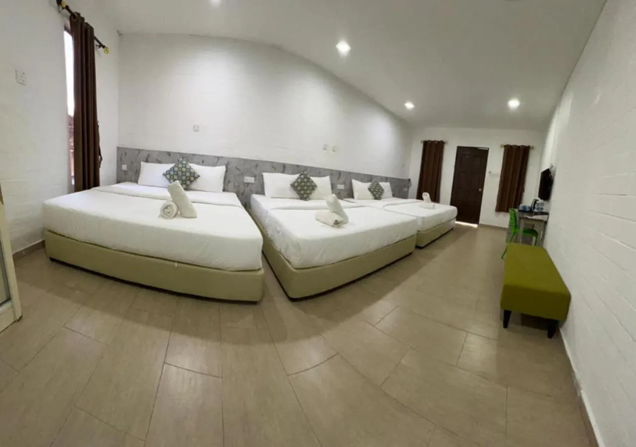 Photo of the whole room, Bed in D'Lima Beach Inn