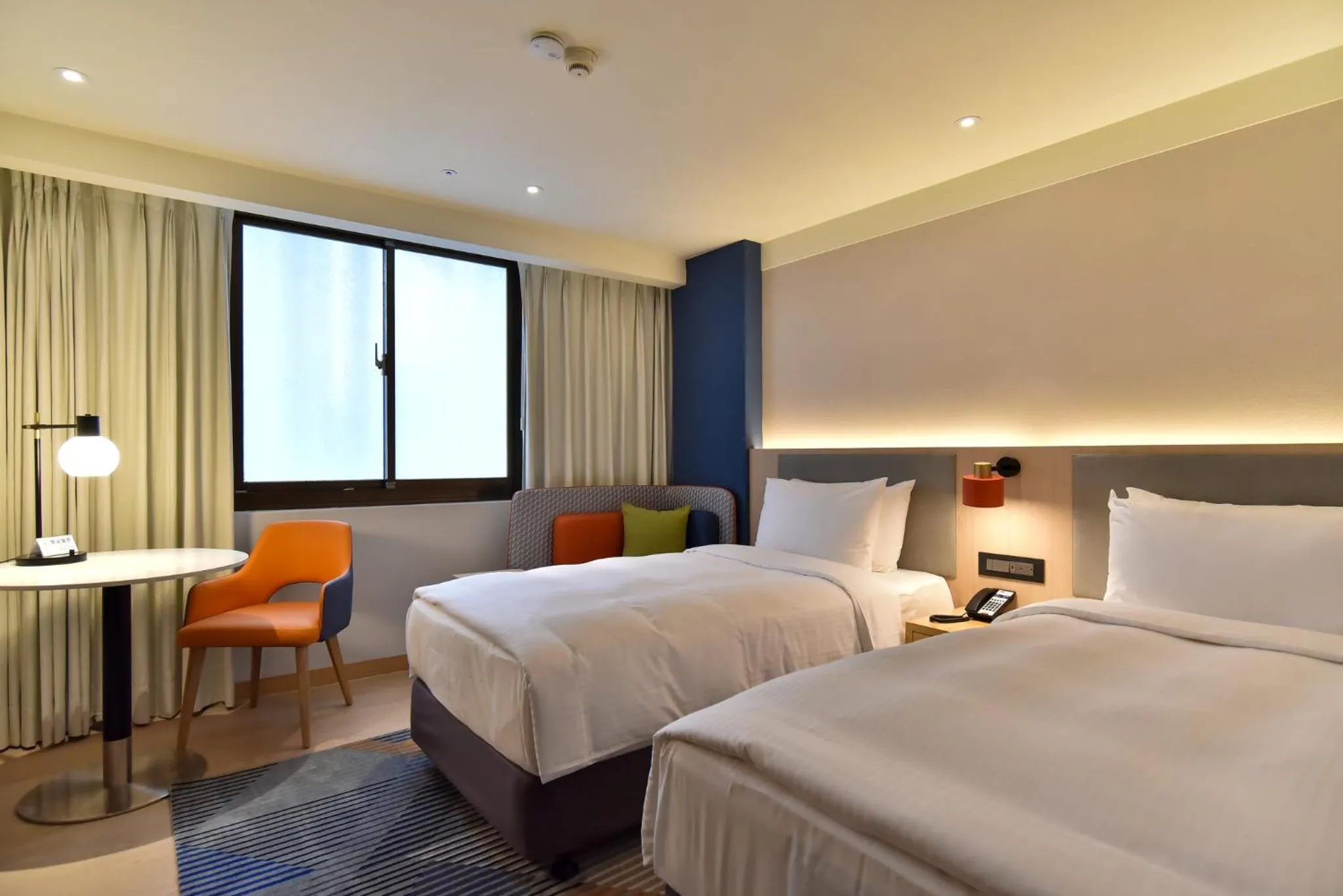 Photo of the whole room, Bed in Holiday Inn Express Taipei Train Station by IHG