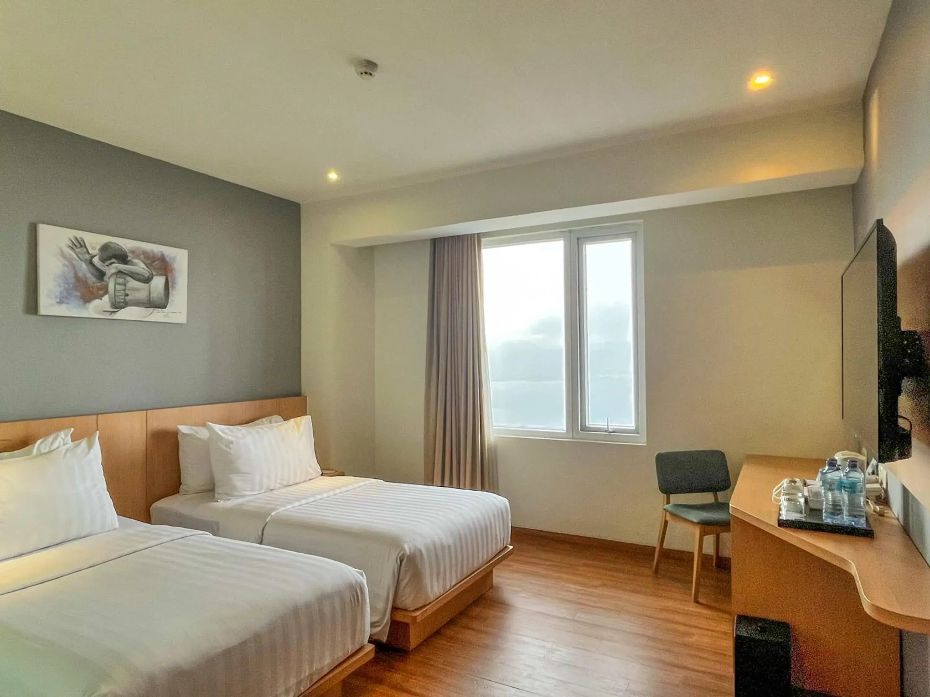 Deluxe Twin Room with Hill View in Hotel Santika Premiere Ambon Deluxe Twin Room with Hill View in Hotel Santika Premiere Ambon