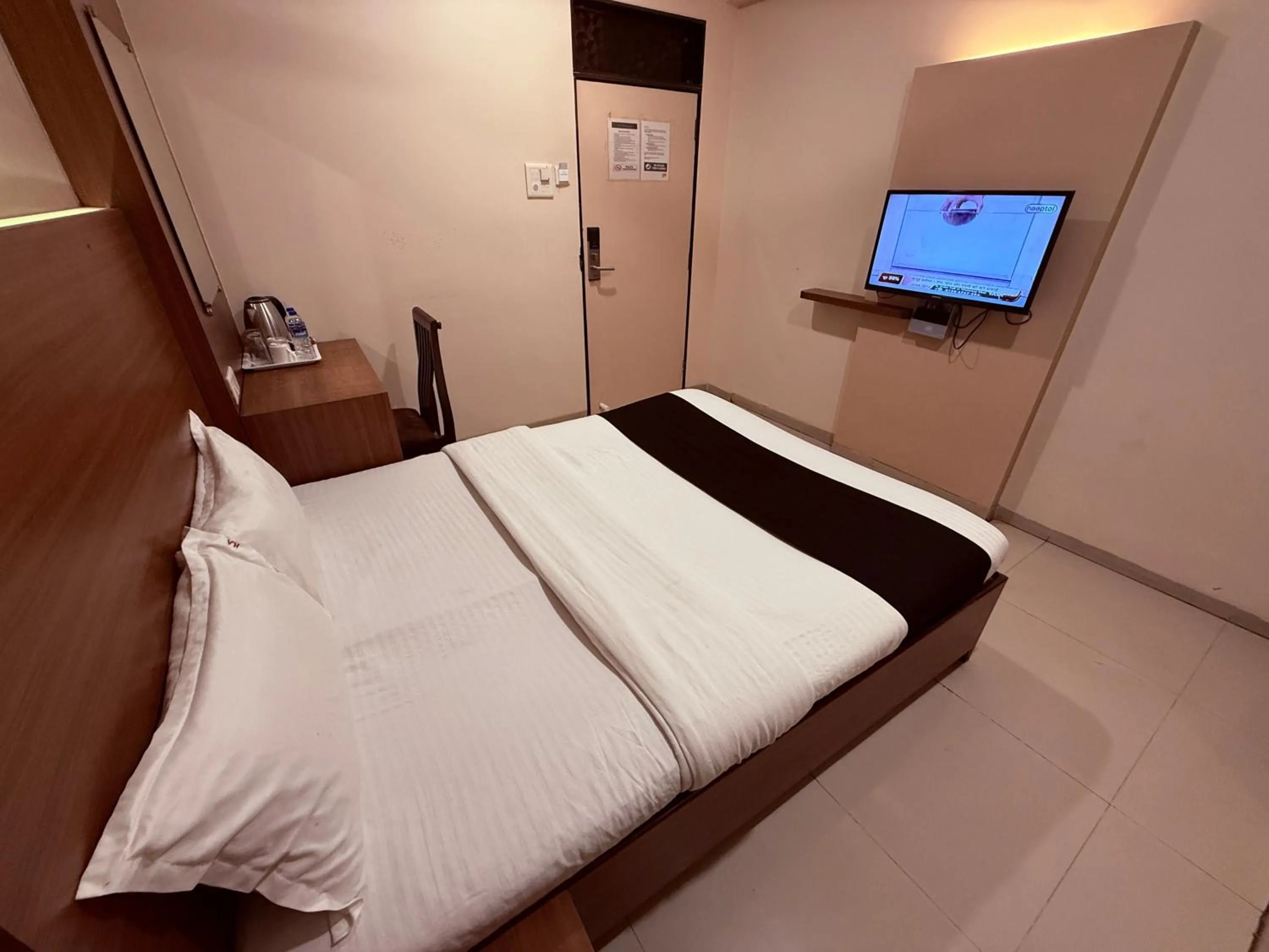 Bed in Hotel Alka Residency