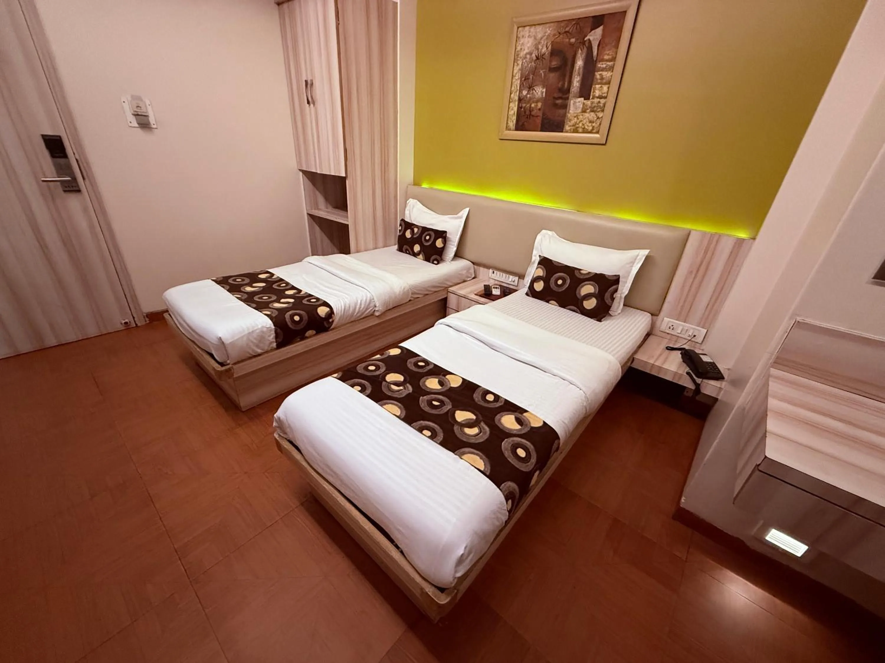 Bed in Hotel Alka Residency