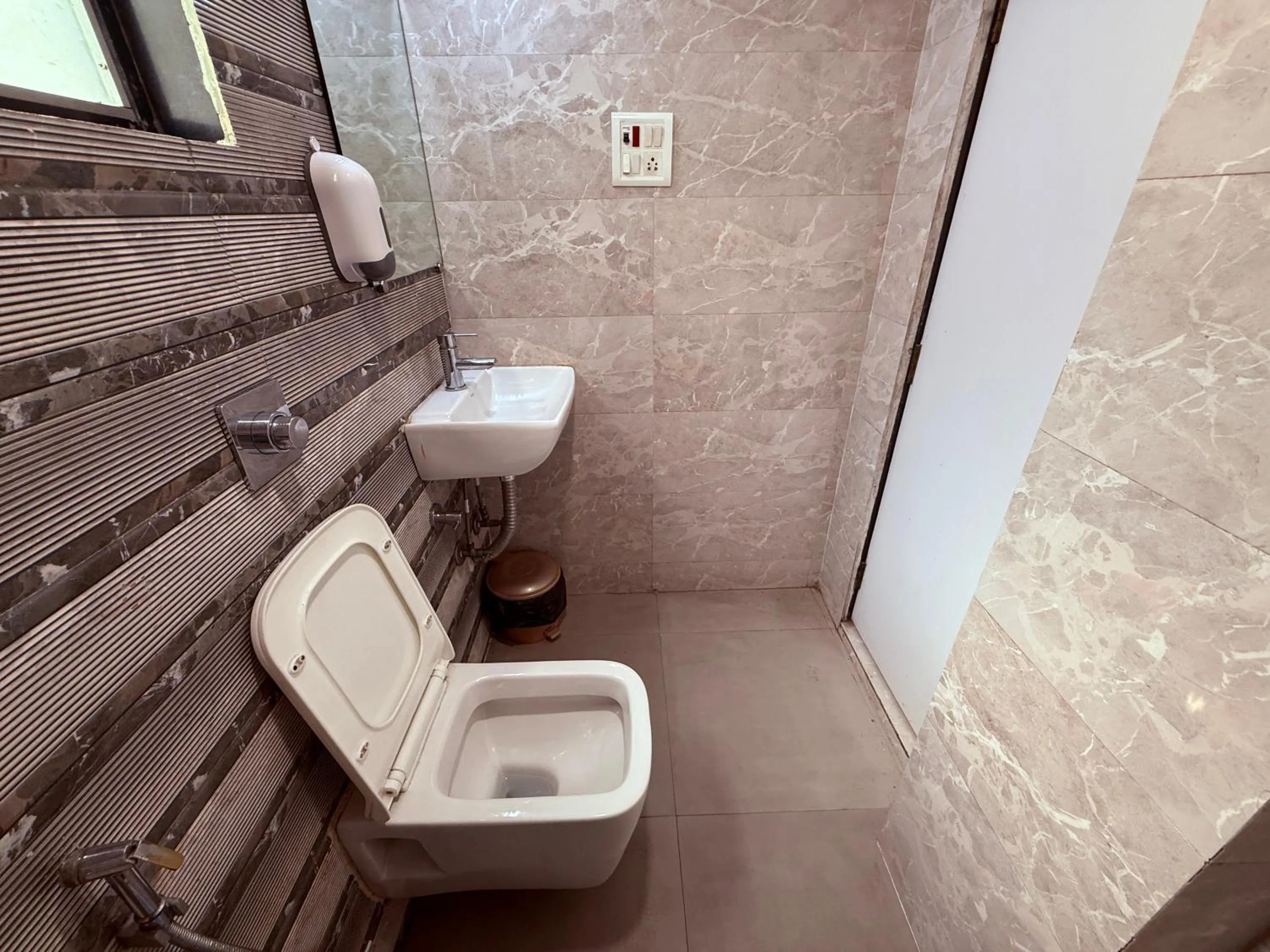 Toilet in Hotel Alka Residency