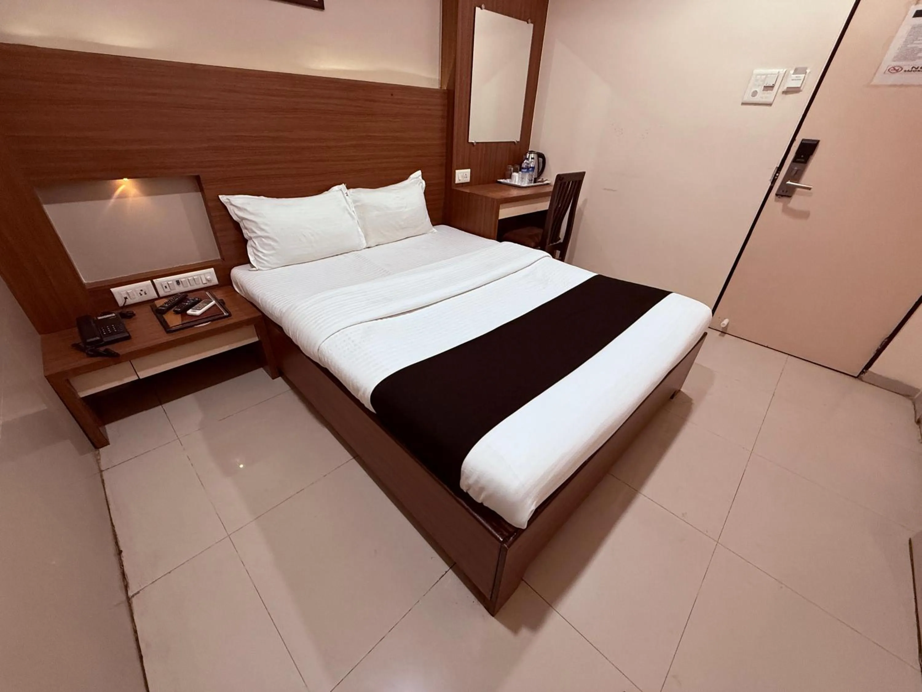 Bed in Hotel Alka Residency