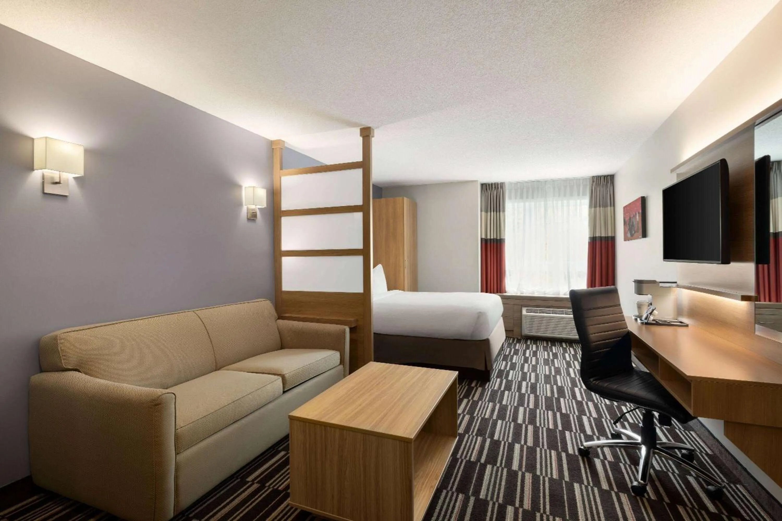 Photo of the whole room, Bed in Microtel Inn & Suites by Wyndham Val-d Or
