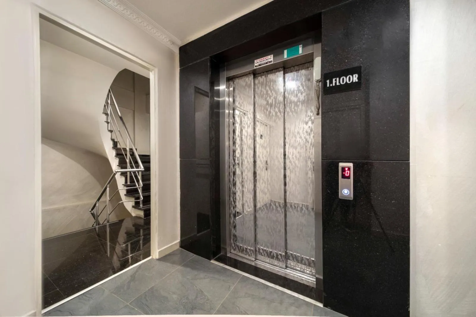 elevator in Deluxe Newport Hotel - Old City