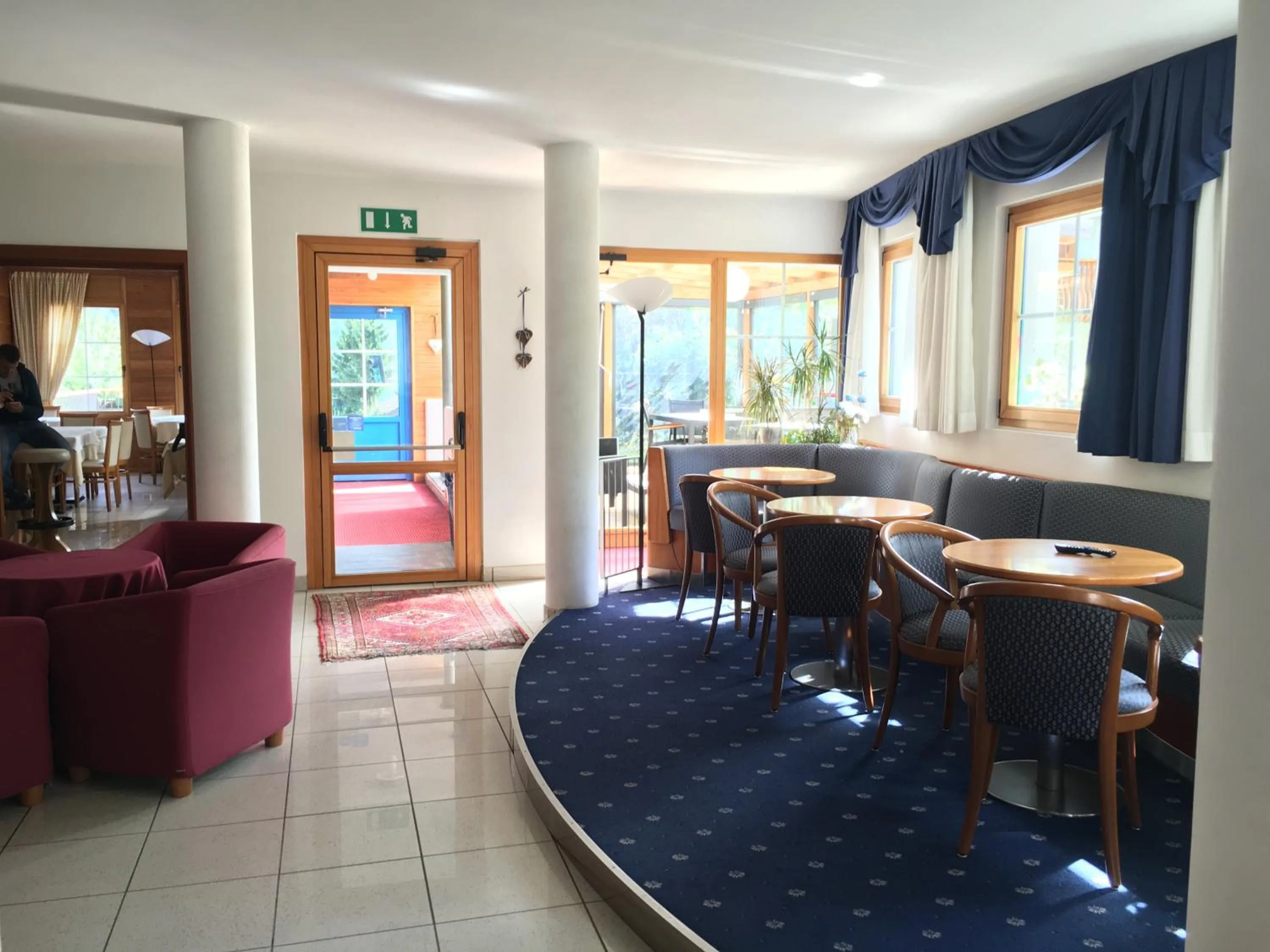 Communal lounge/ TV room in Garni Enrosadira