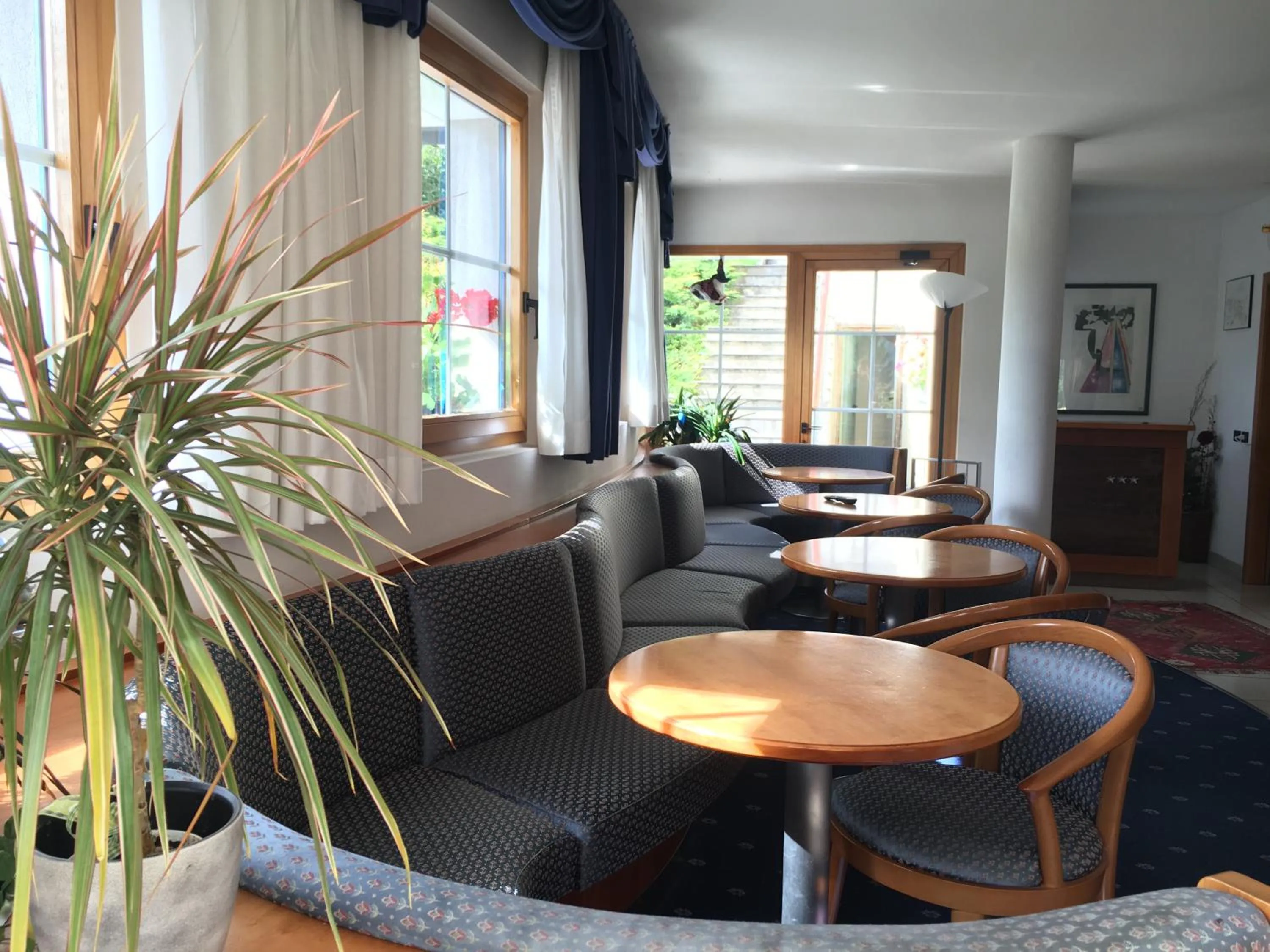 Communal lounge/ TV room in Garni Enrosadira