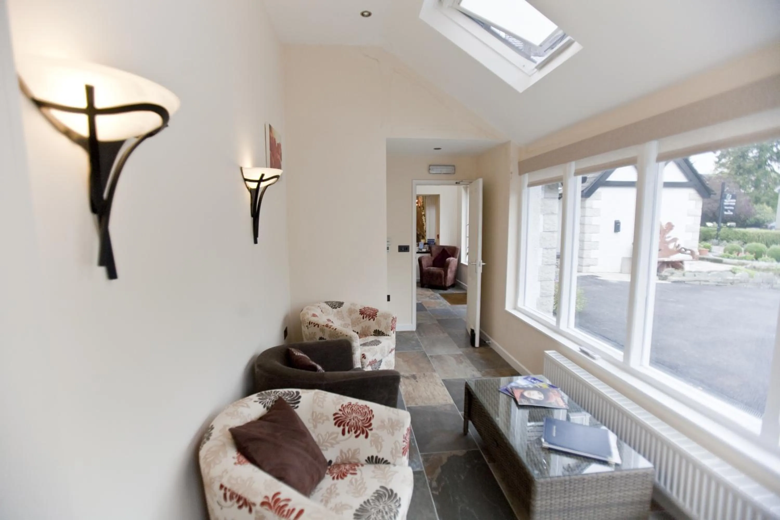 Communal lounge/ TV room in Hawksmoor Guest House