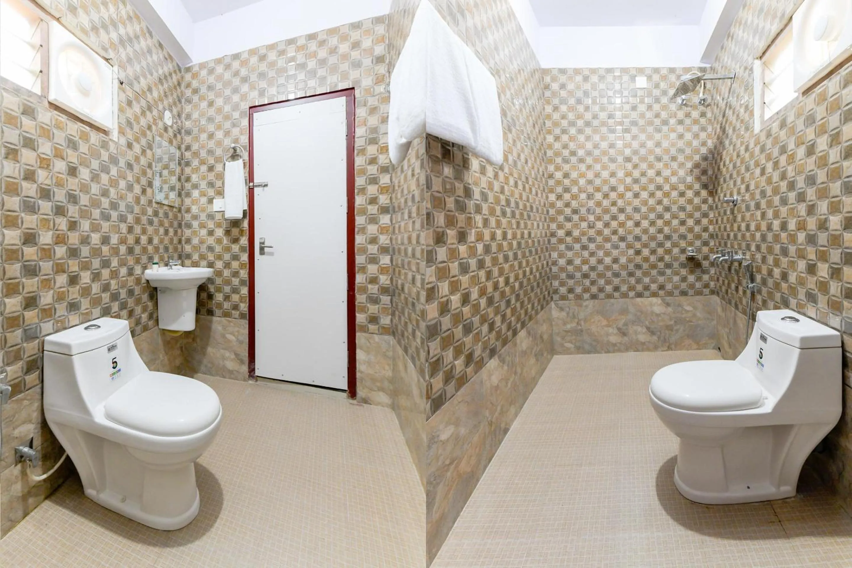 Bathroom in Hotel O Amare Highway Residency