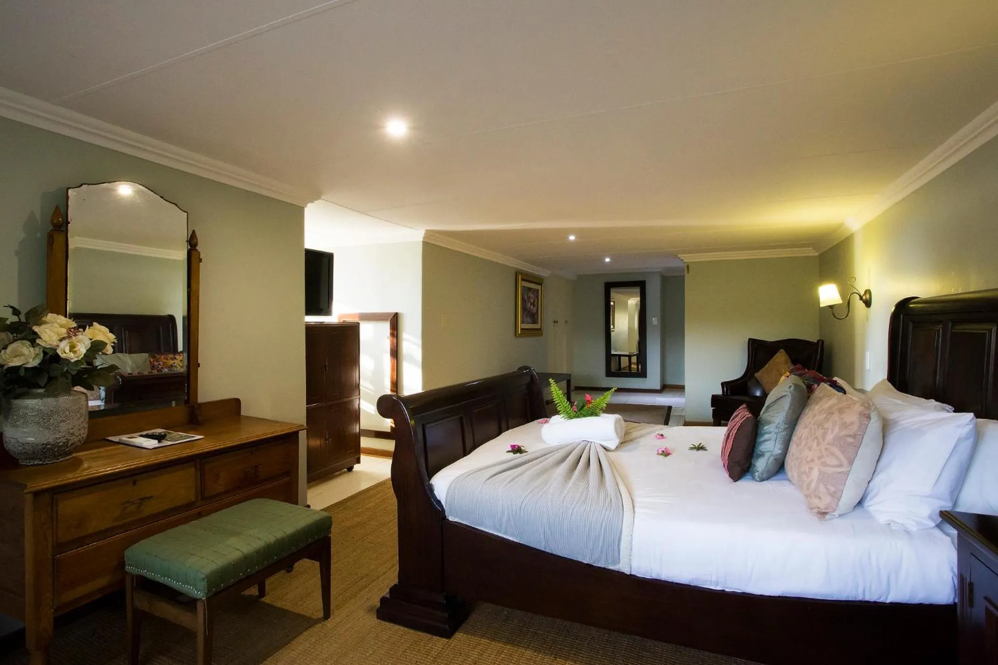Bed in Tamboti Lodge Guest House