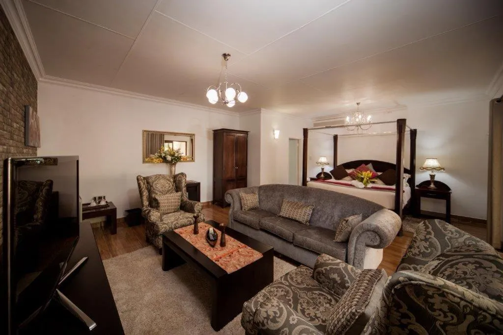 Bed in Tamboti Lodge Guest House