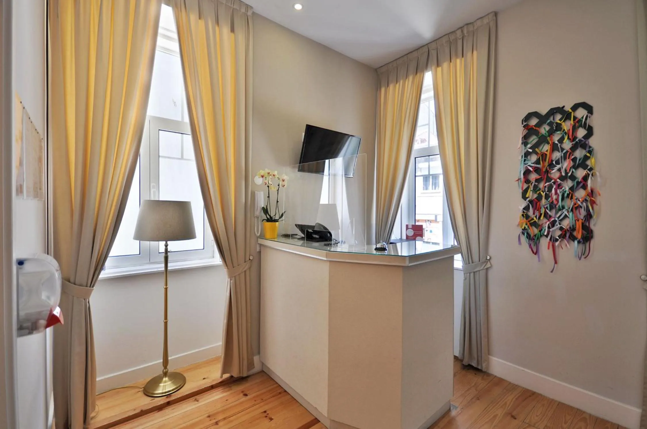 Lobby or reception in Porto Charming Hotel