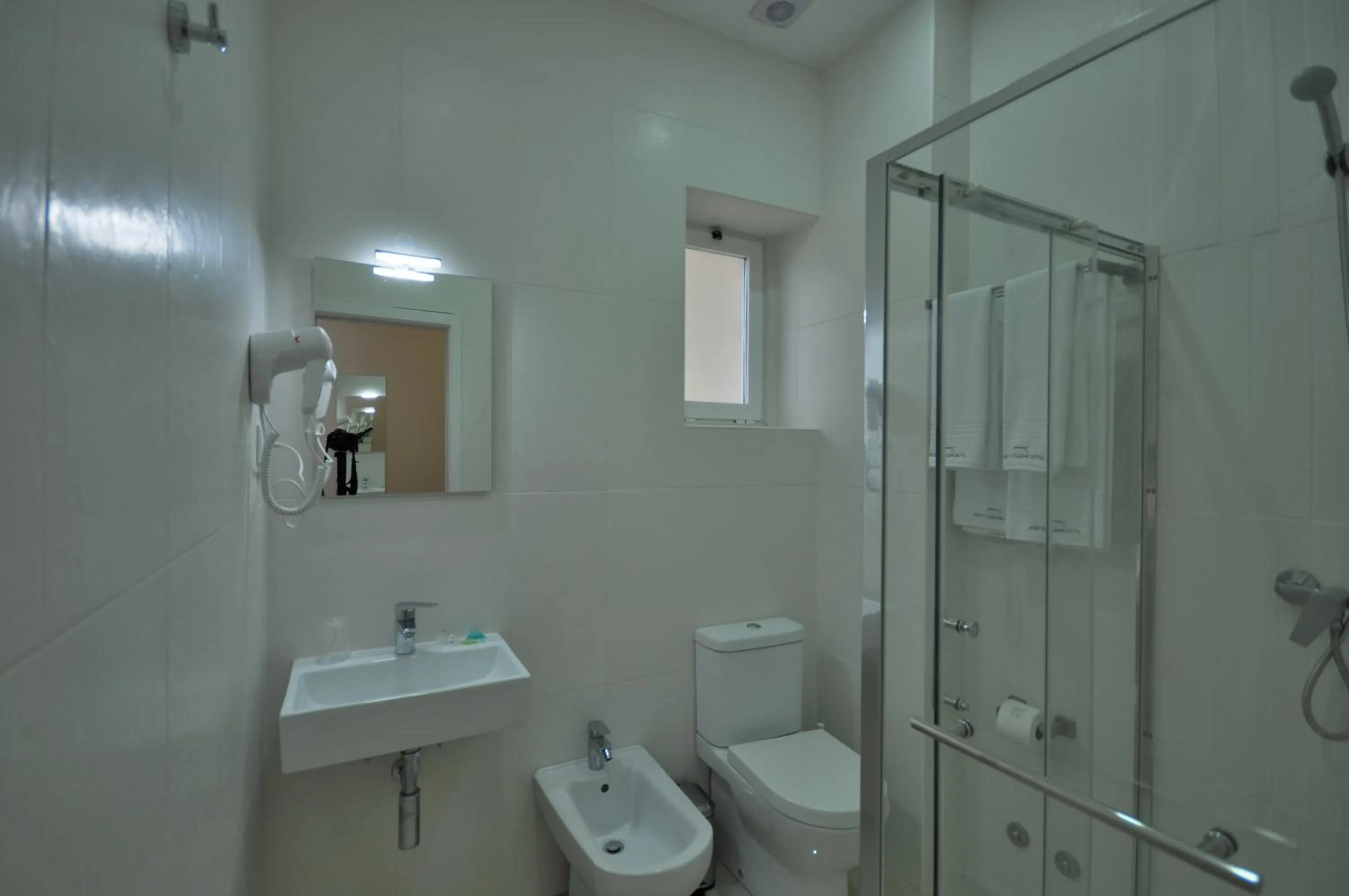 Bathroom in Porto Charming Hotel