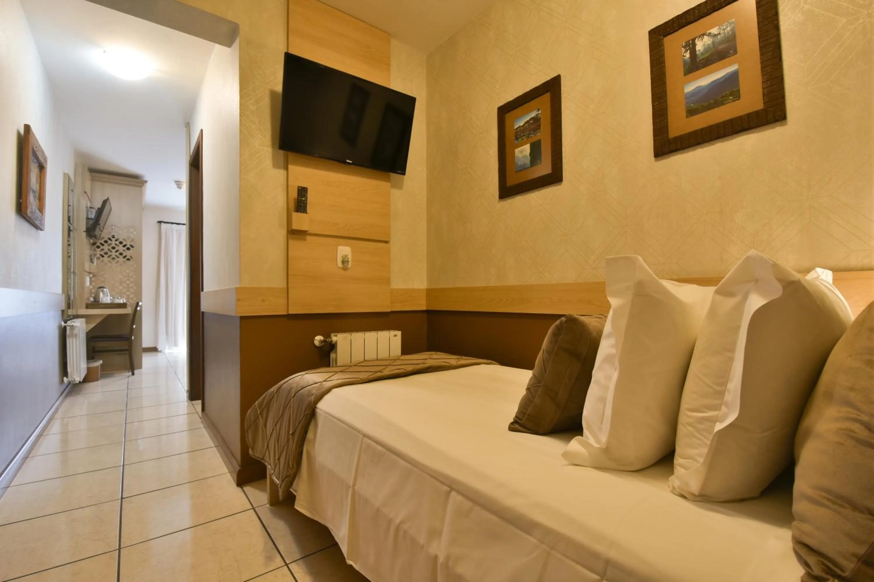 Bed in Pousada Belluno