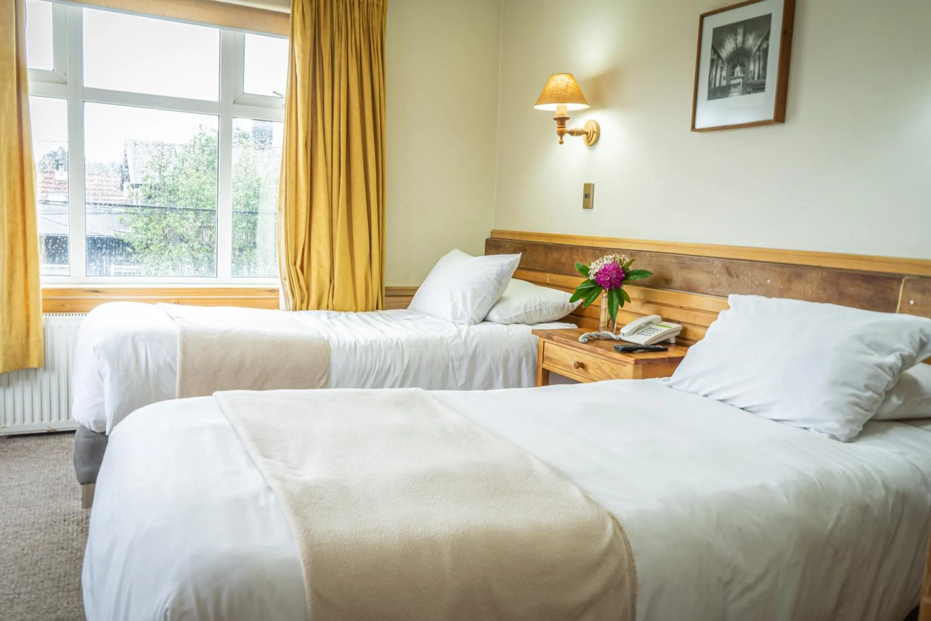 Photo of the whole room, Bed in Hotel Museo El Greco Puerto Varas