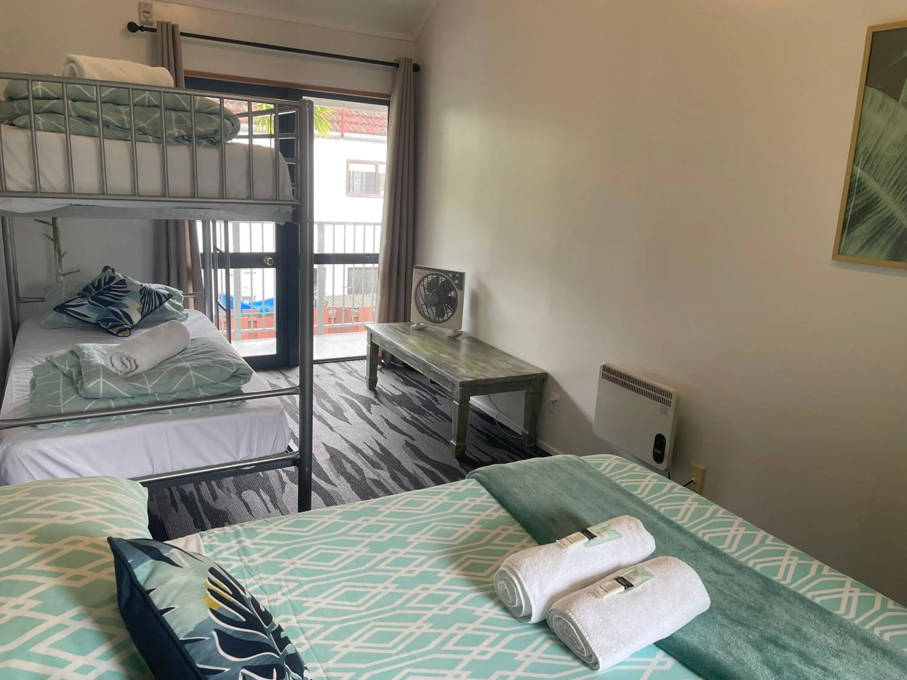 Bed in Peppertree Lodge