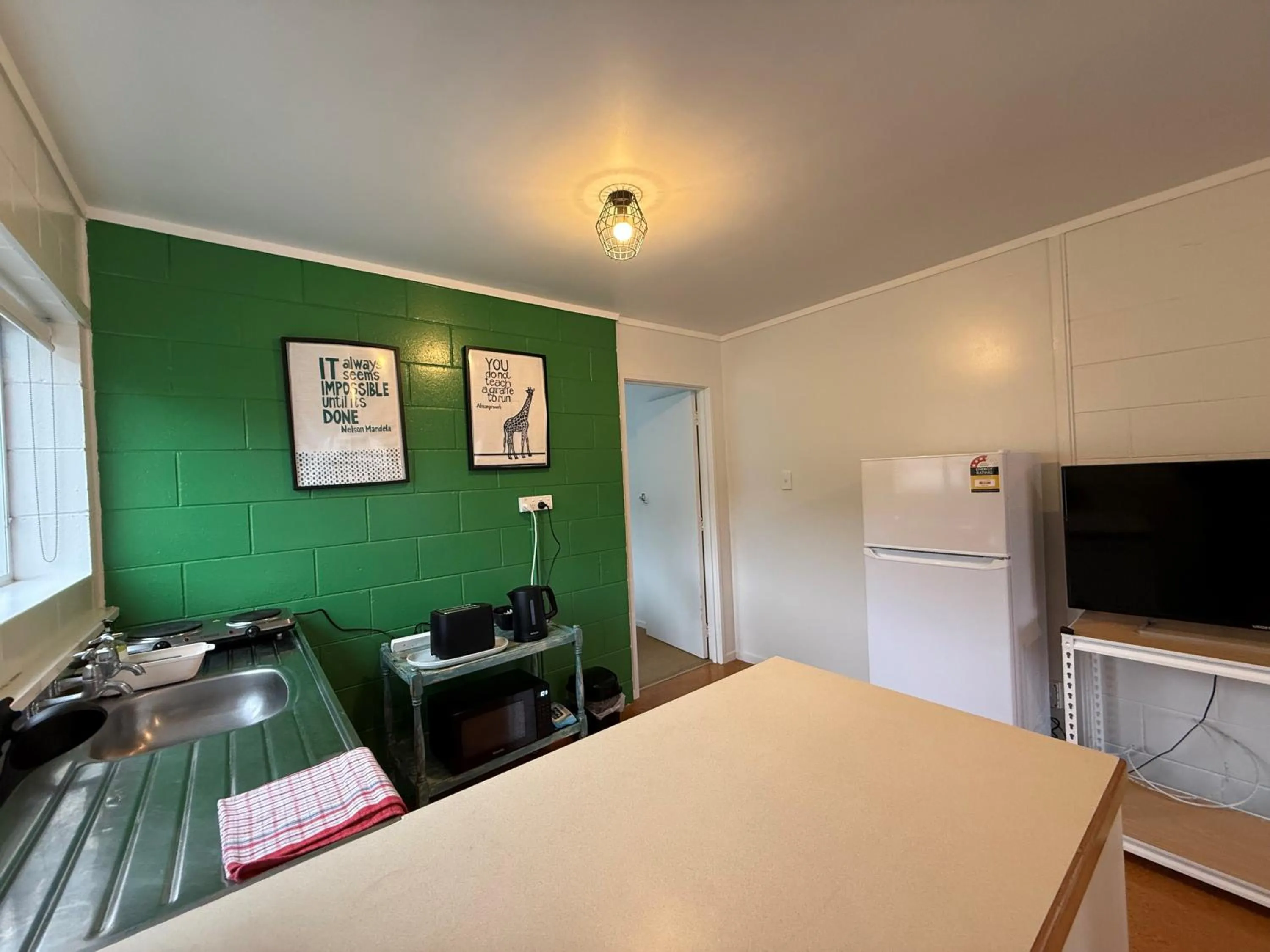 Kitchen or kitchenette in Peppertree Lodge