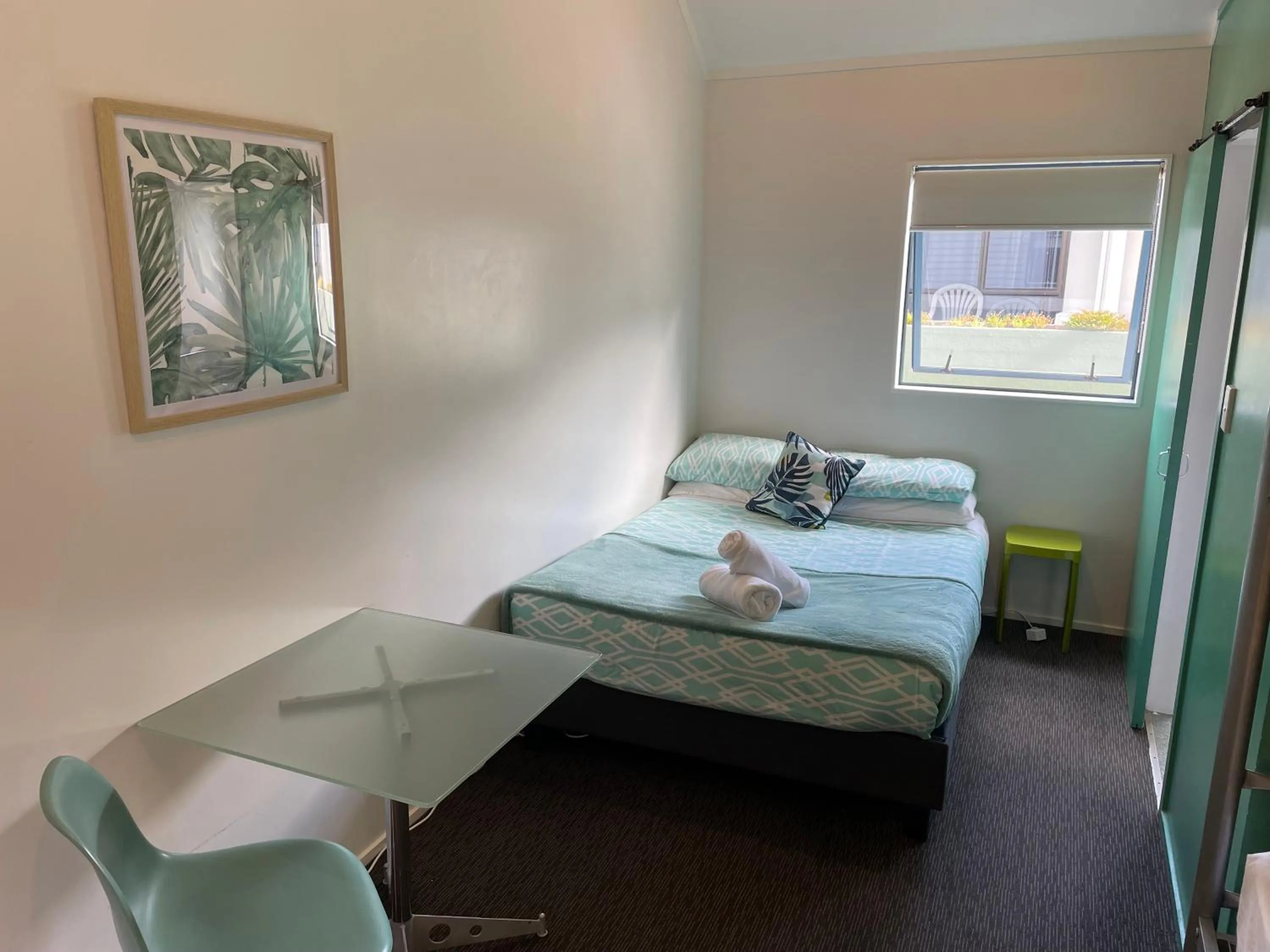 Bed in Peppertree Lodge