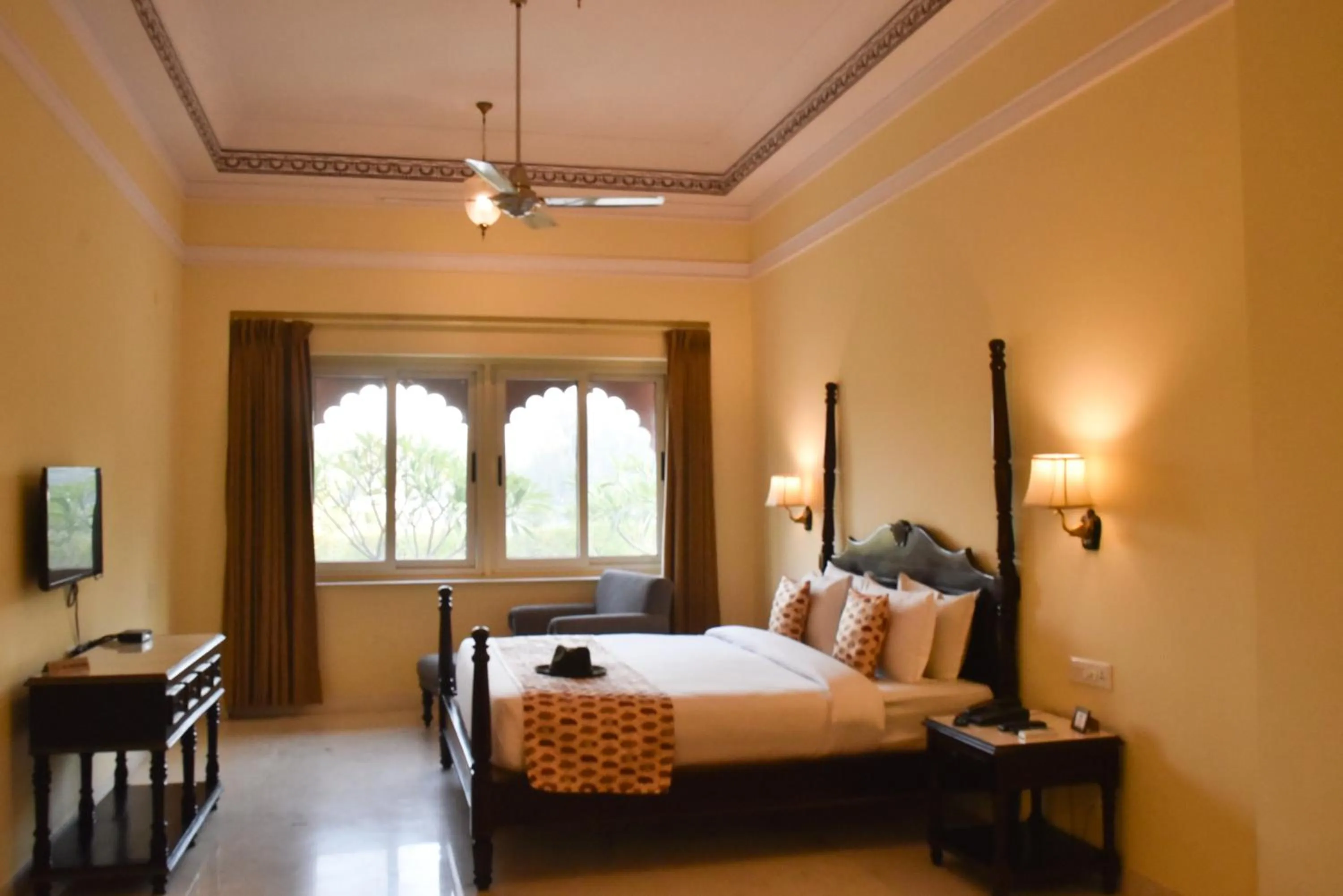 Bed in Umaid Palace - A Lakeside Resort - 25 minutes from Mehandipur Balaji - 20 minutes from Chand Baori Stepwell Abhaneri & 40 minutes from Bhangarh Fort