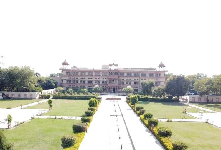 Property building in Umaid Palace - A Lakeside Resort - 25 minutes from Mehandipur Balaji - 20 minutes from Chand Baori Stepwell Abhaneri & 40 minutes from Bhangarh Fort