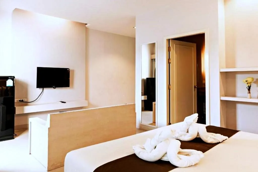 Bed in Khuang Singh Residence & Hotel Chiangmai