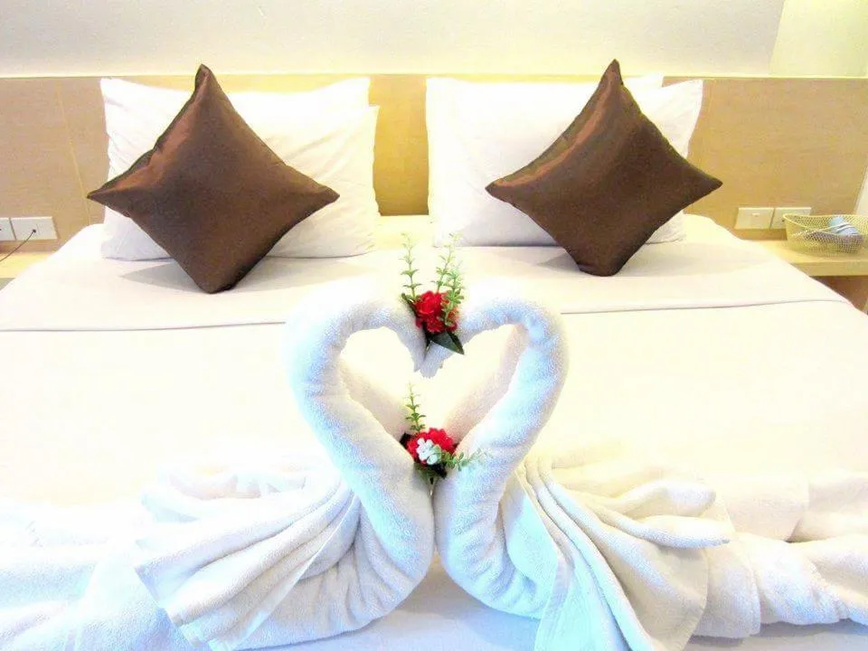 Bed in Khuang Singh Residence & Hotel Chiangmai