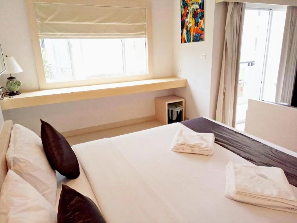 Bed in Khuang Singh Residence & Hotel Chiangmai