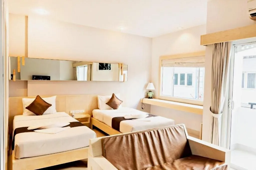 Bed in Khuang Singh Residence & Hotel Chiangmai