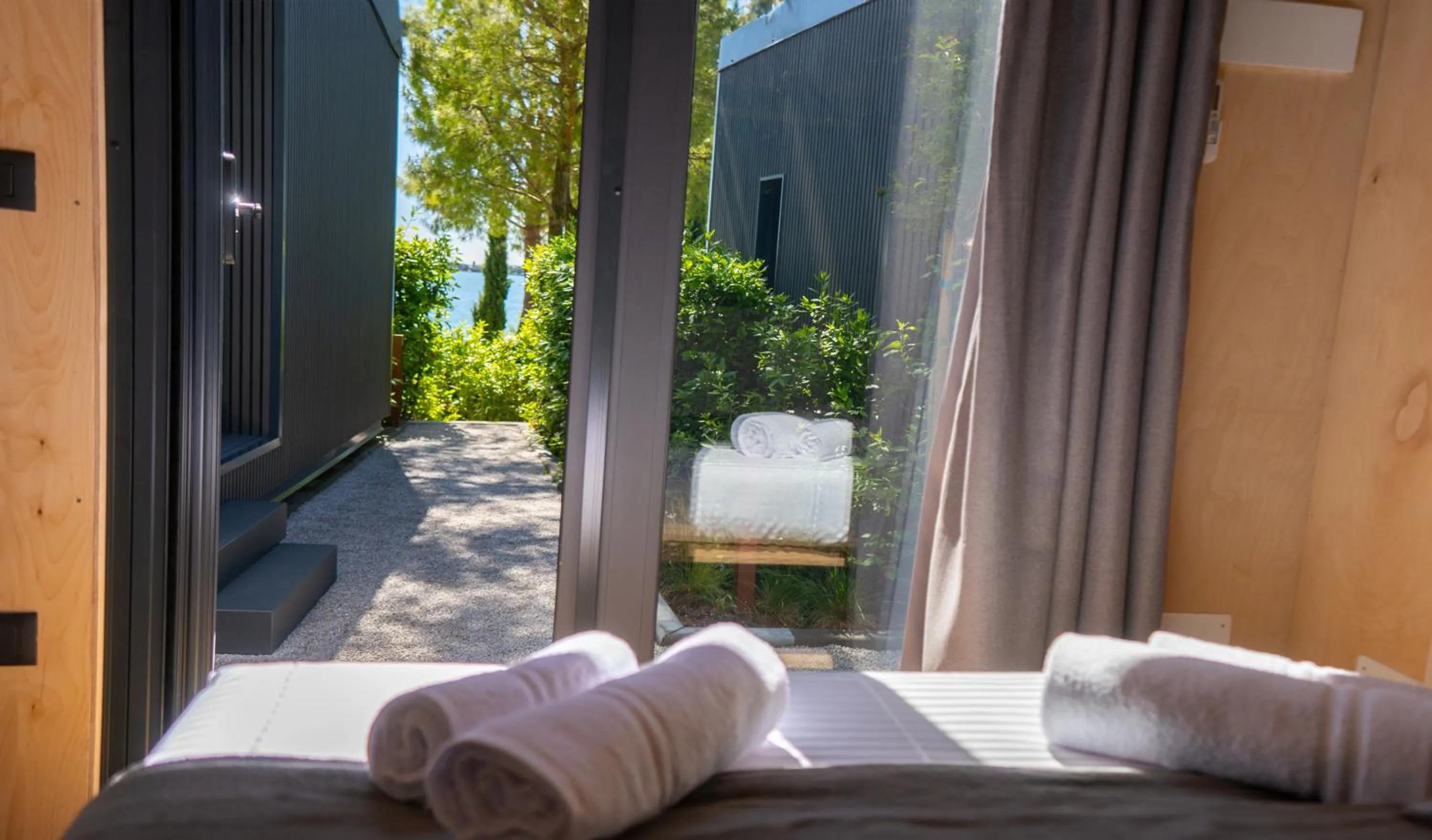 Garden view, Bed in Concept Village Piccola Gardiola