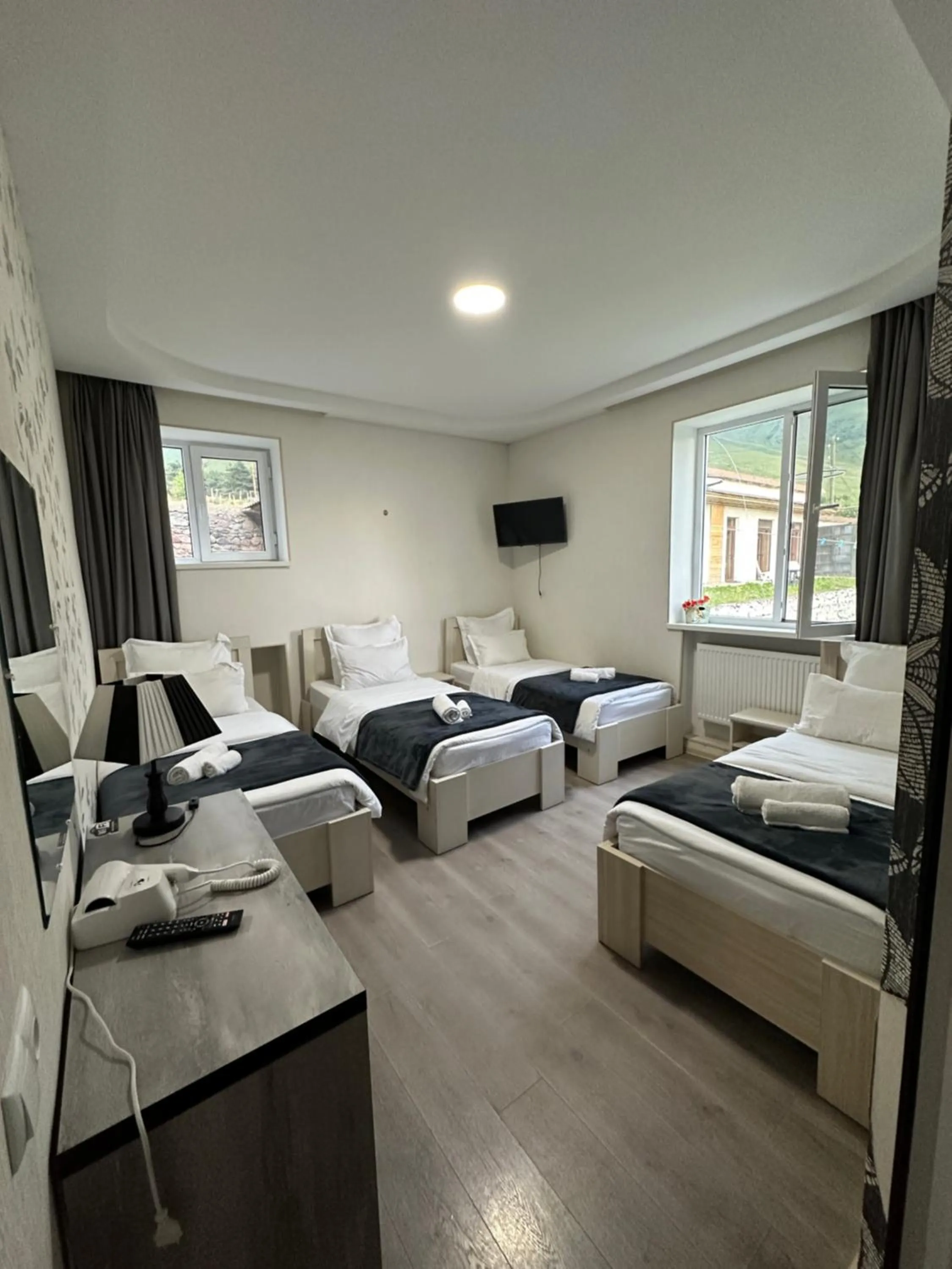 Bed in Hotel NOA Kazbegi