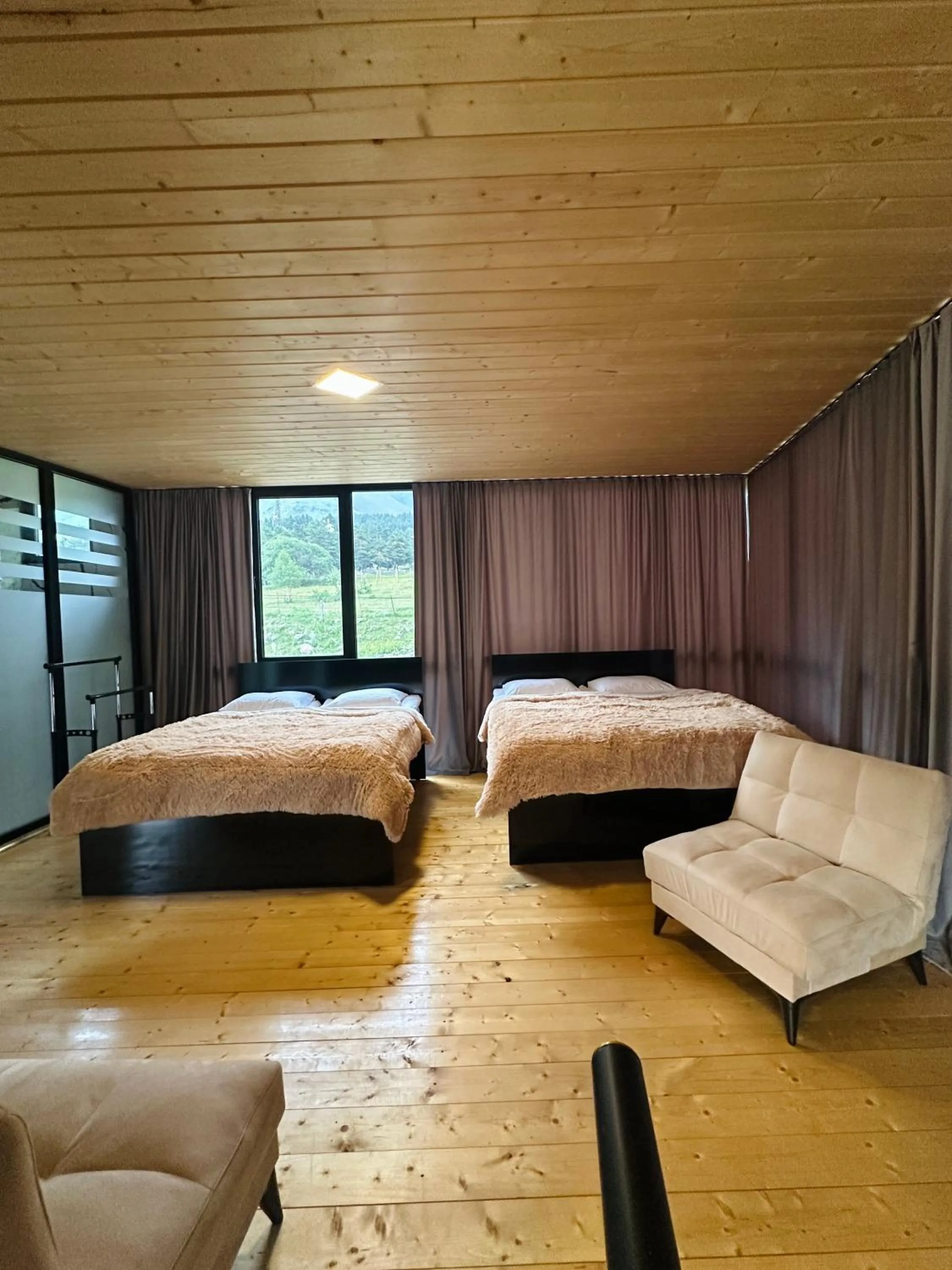 Bed in Hotel NOA Kazbegi