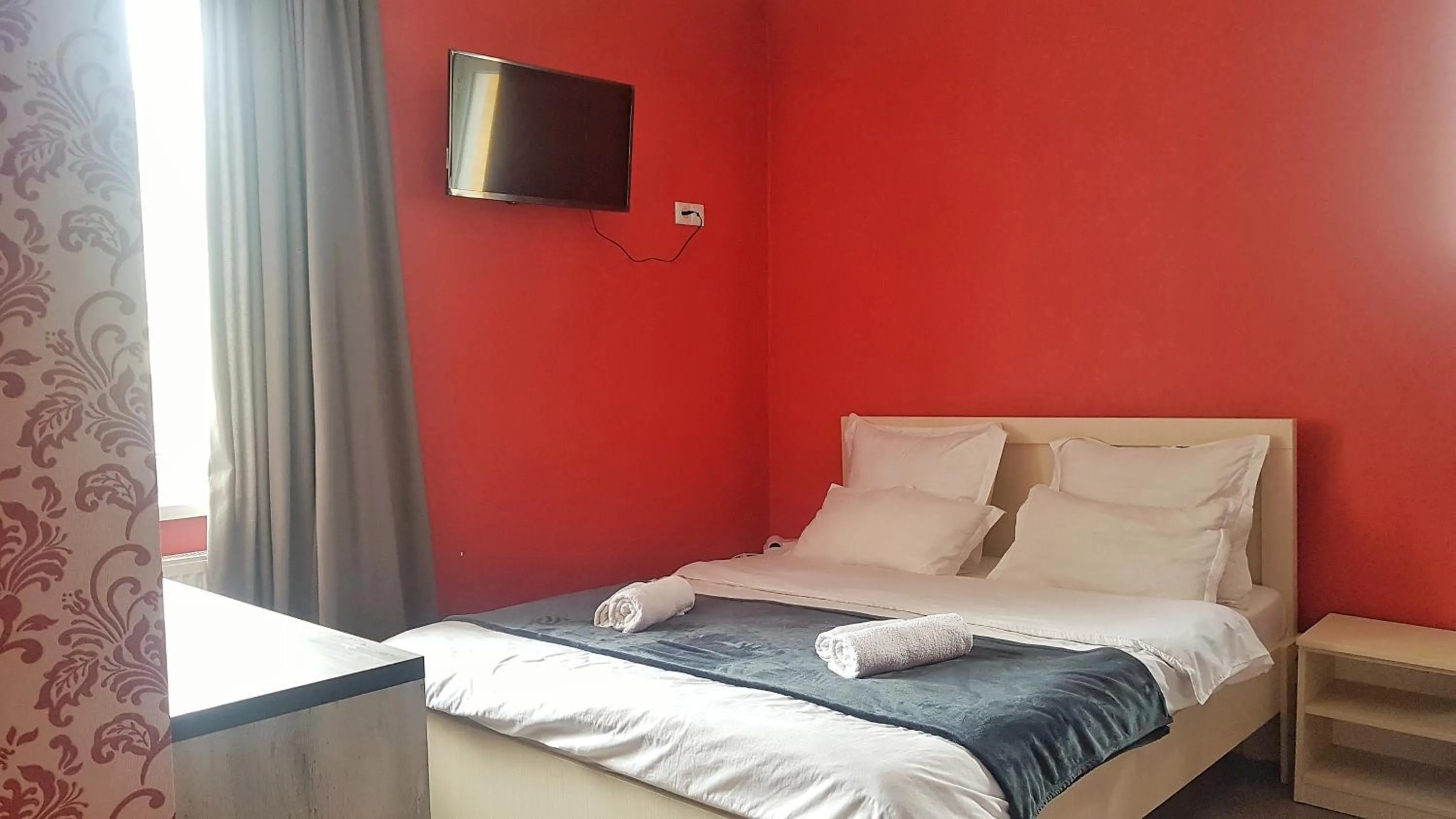 Bed in Hotel NOA Kazbegi