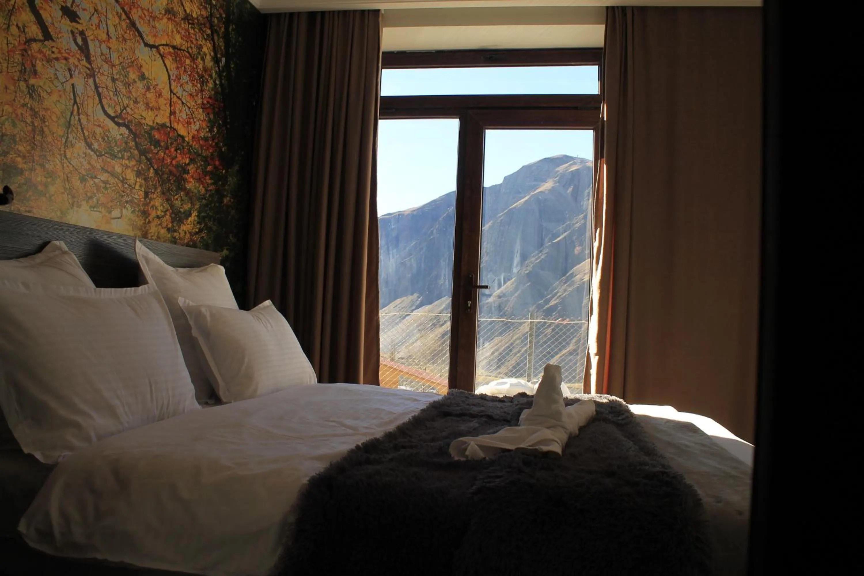 Bed in Hotel NOA Kazbegi