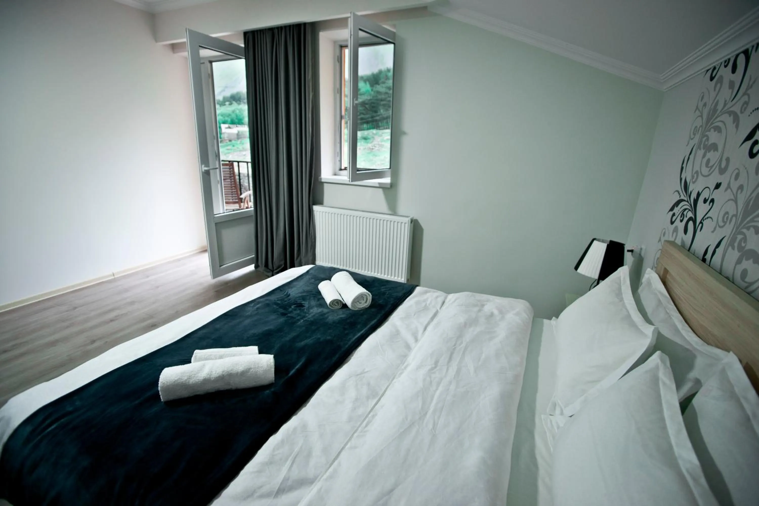 Bed in Hotel NOA Kazbegi