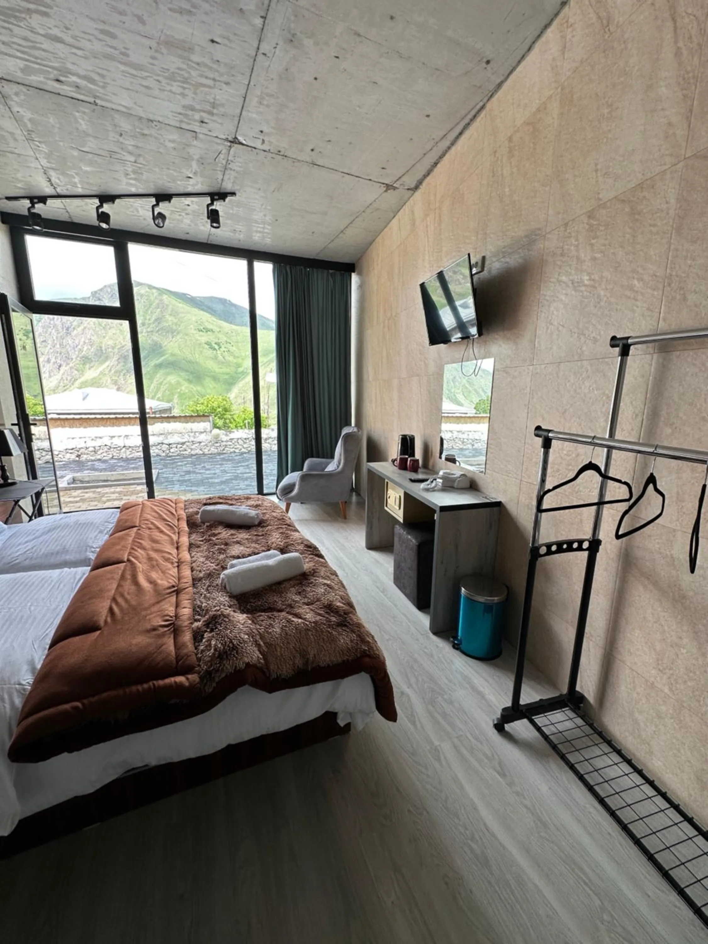 Bed in Hotel NOA Kazbegi