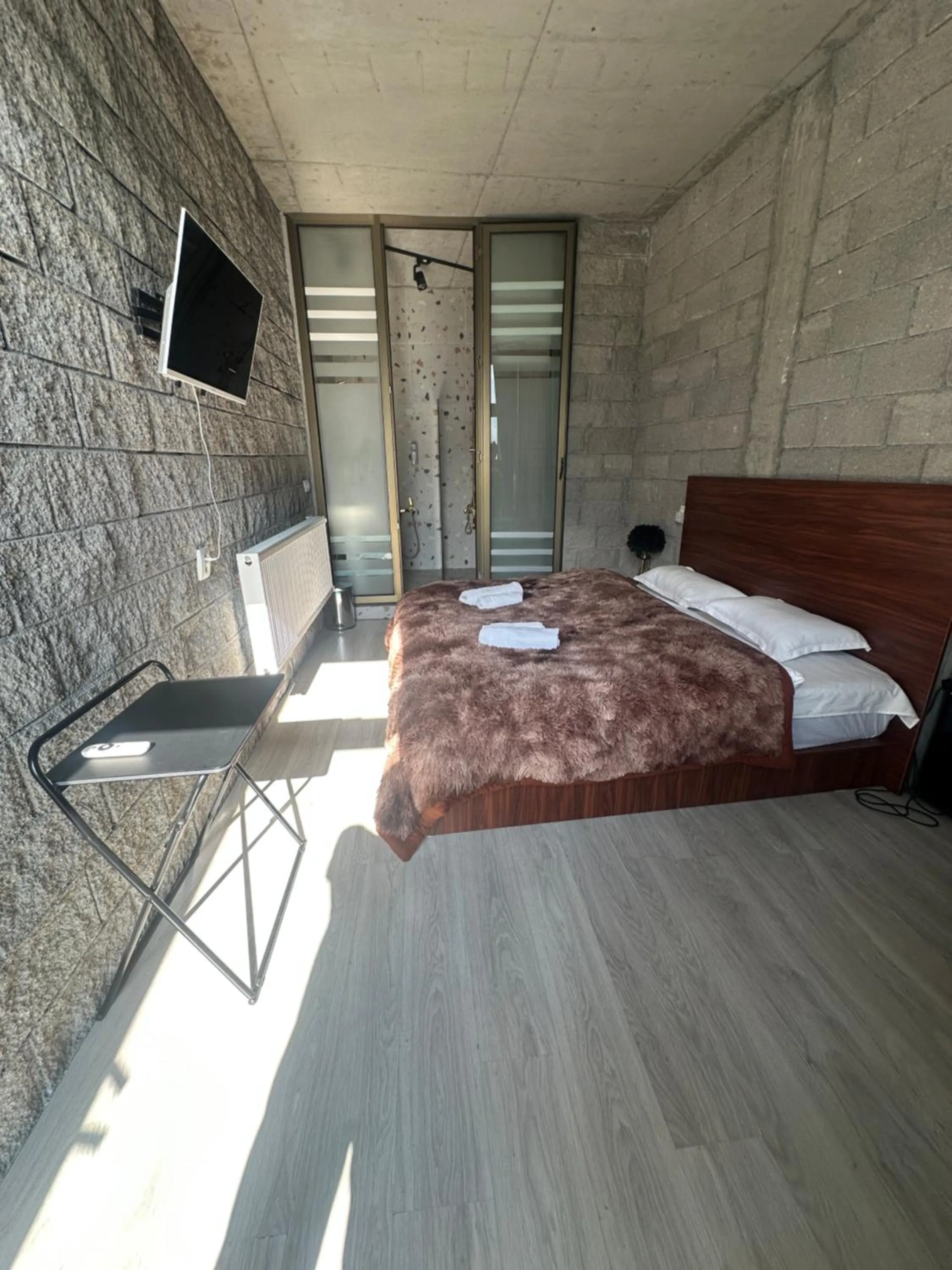 Bed in Hotel NOA Kazbegi