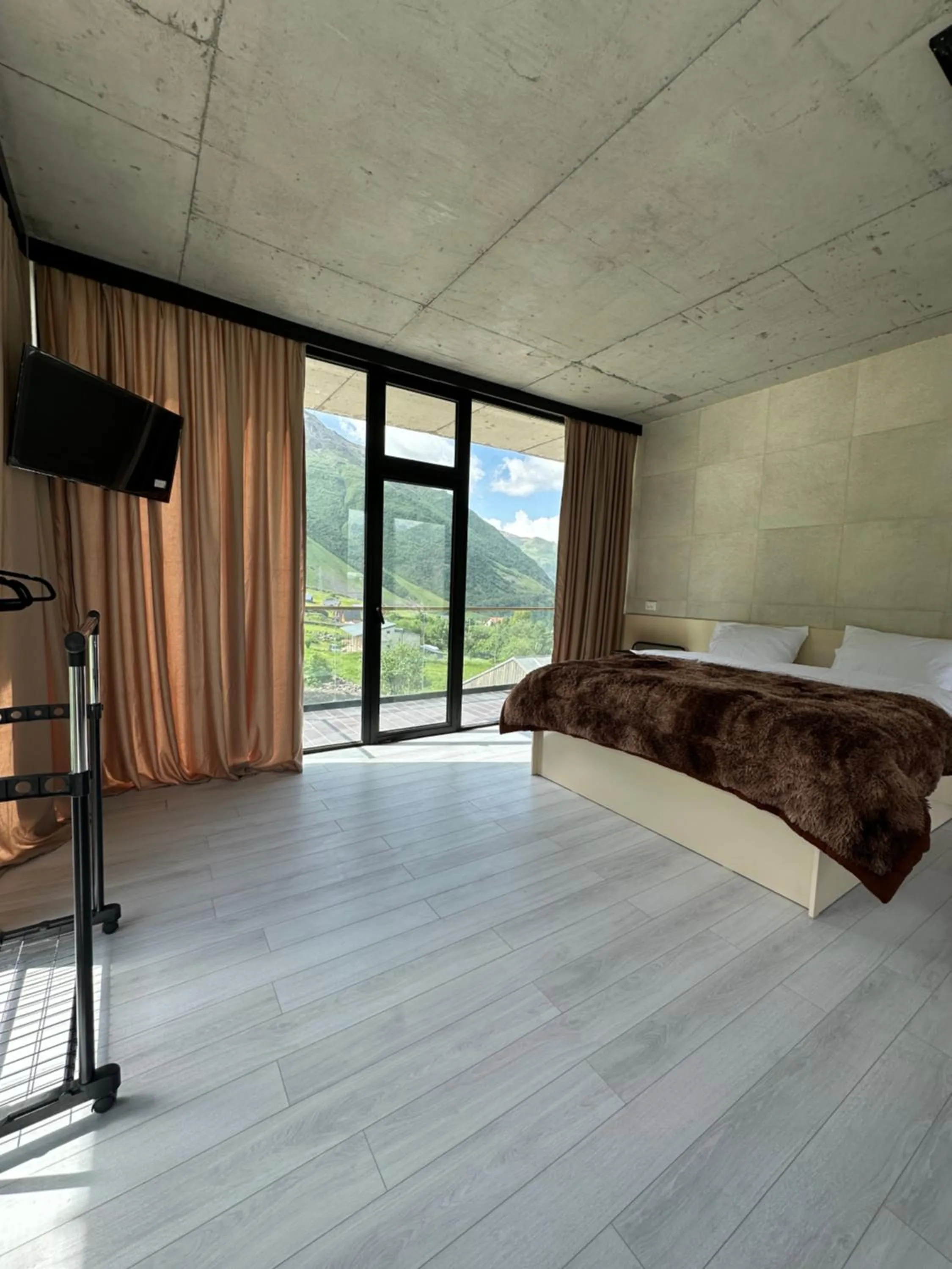 Bed in Hotel NOA Kazbegi