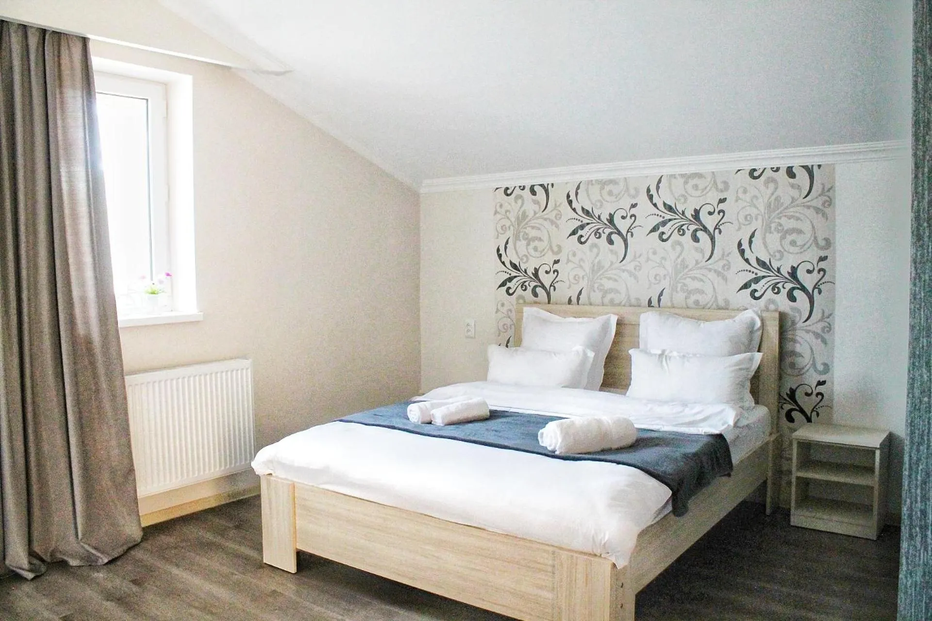 Bed in Hotel NOA Kazbegi