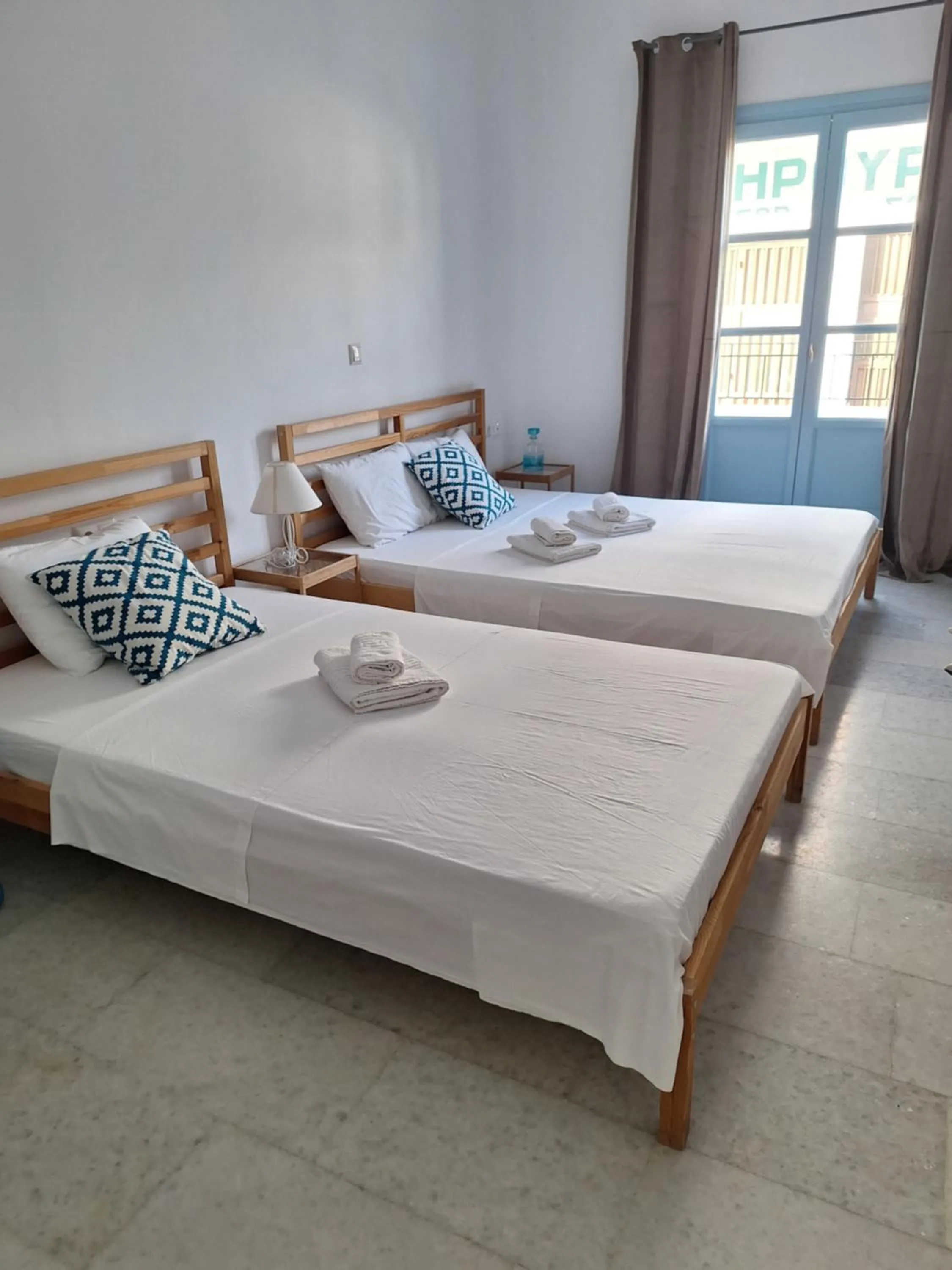 Photo of the whole room, Bed in Giannakis Filoxenia