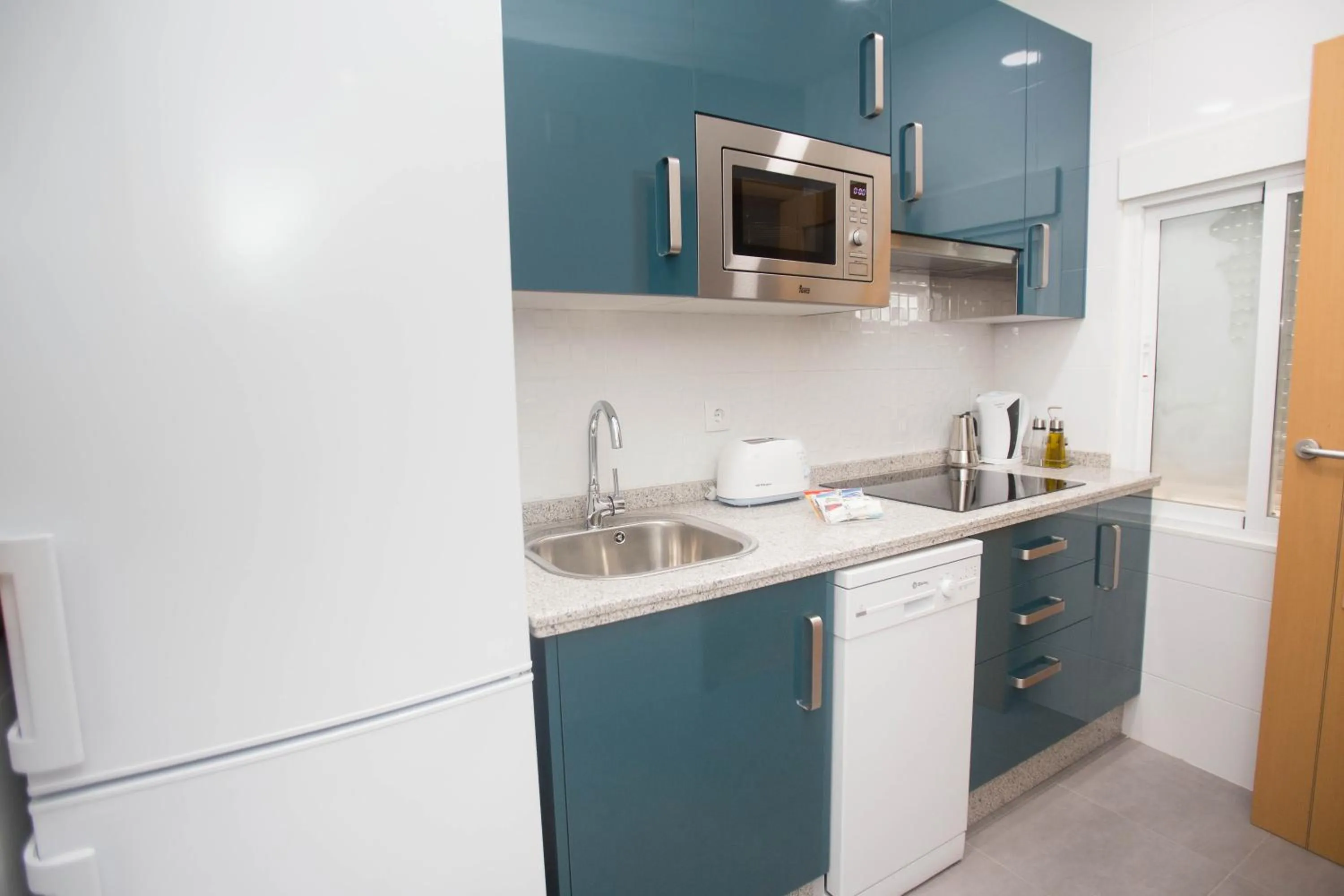 Kitchen or kitchenette in Apartamentos Soho Boutique Plaza Mayor Caceres