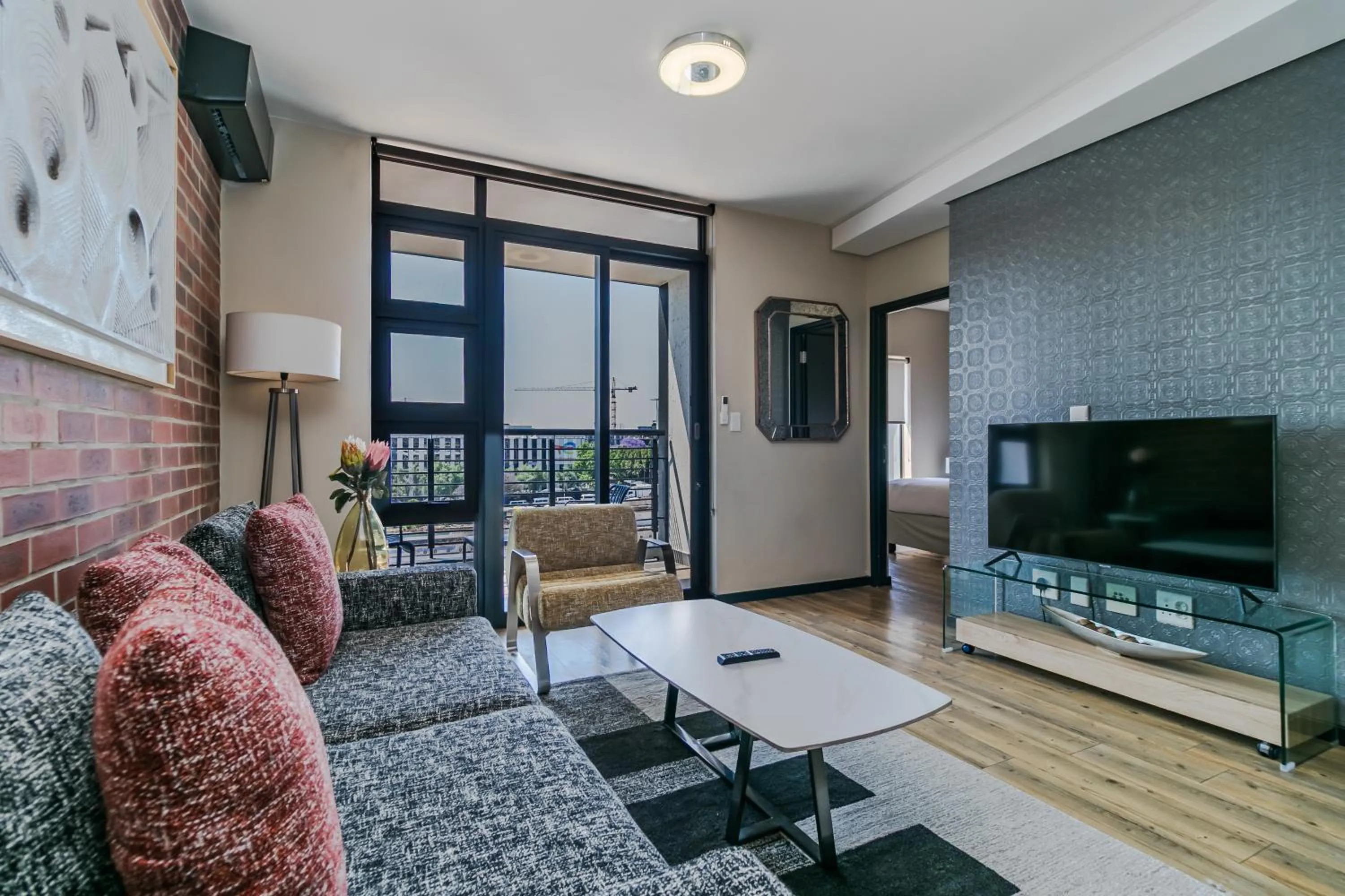 Communal lounge/ TV room in Easy Stay - The Vantage Rosebank