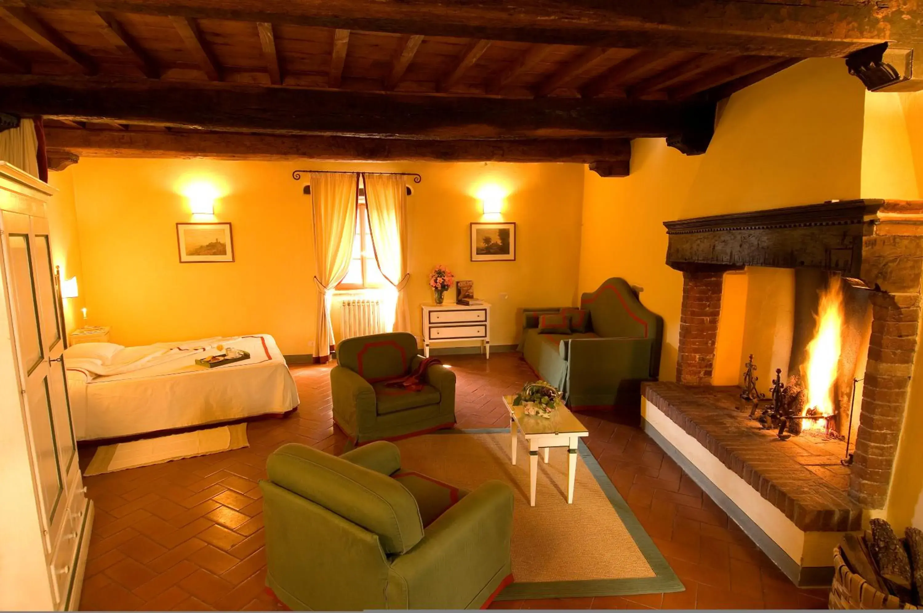 Superior Double Room with Fireplace in Castello Di Gargonza Superior Double Room with Fireplace in Castello Di Gargonza