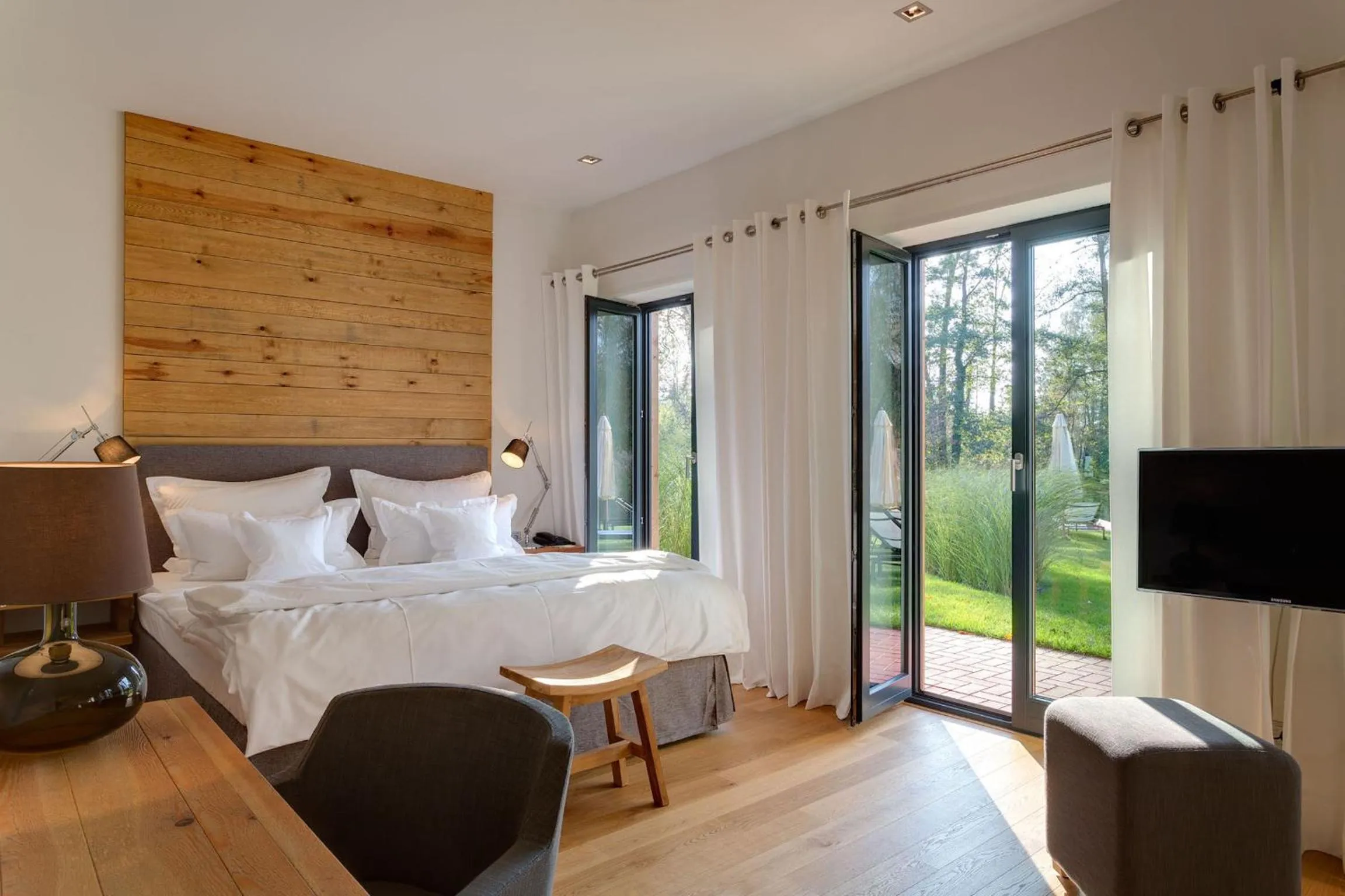 Bed in Hotel Strandhaus - Boutique Resort & Spa