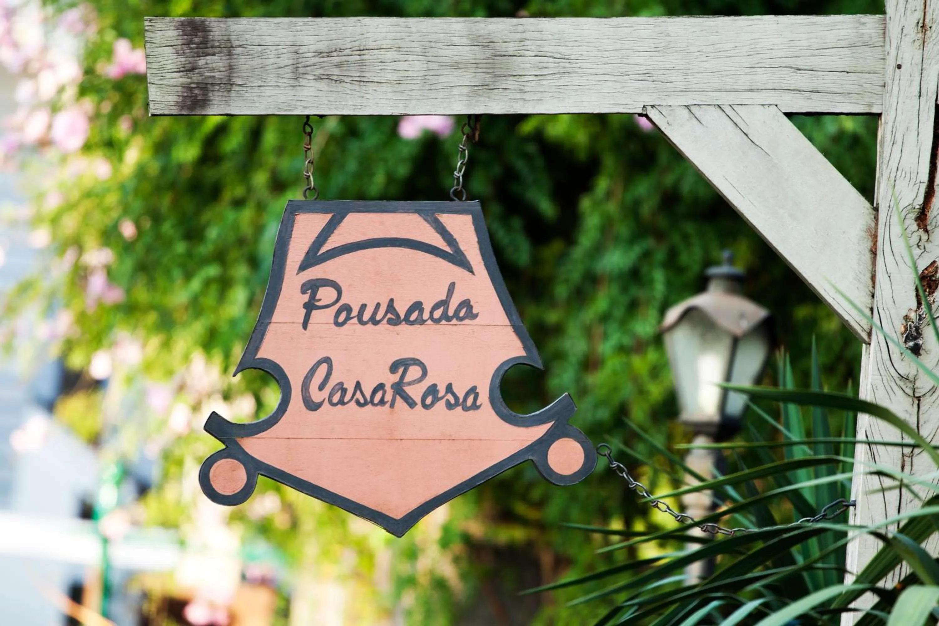 Logo/Certificate/Sign in Pousada Casa Rosa