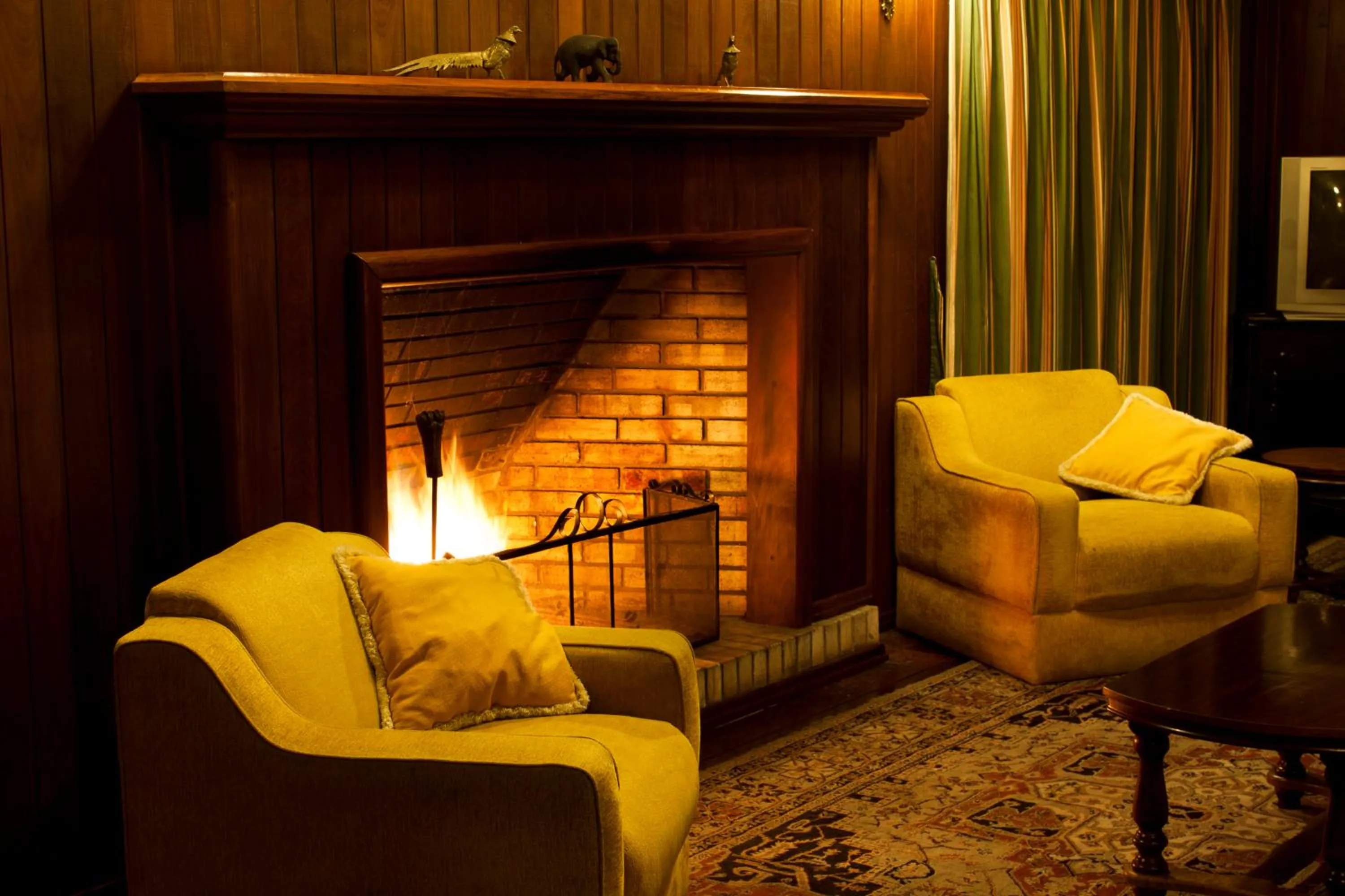 Living room in Pousada Casa Rosa
