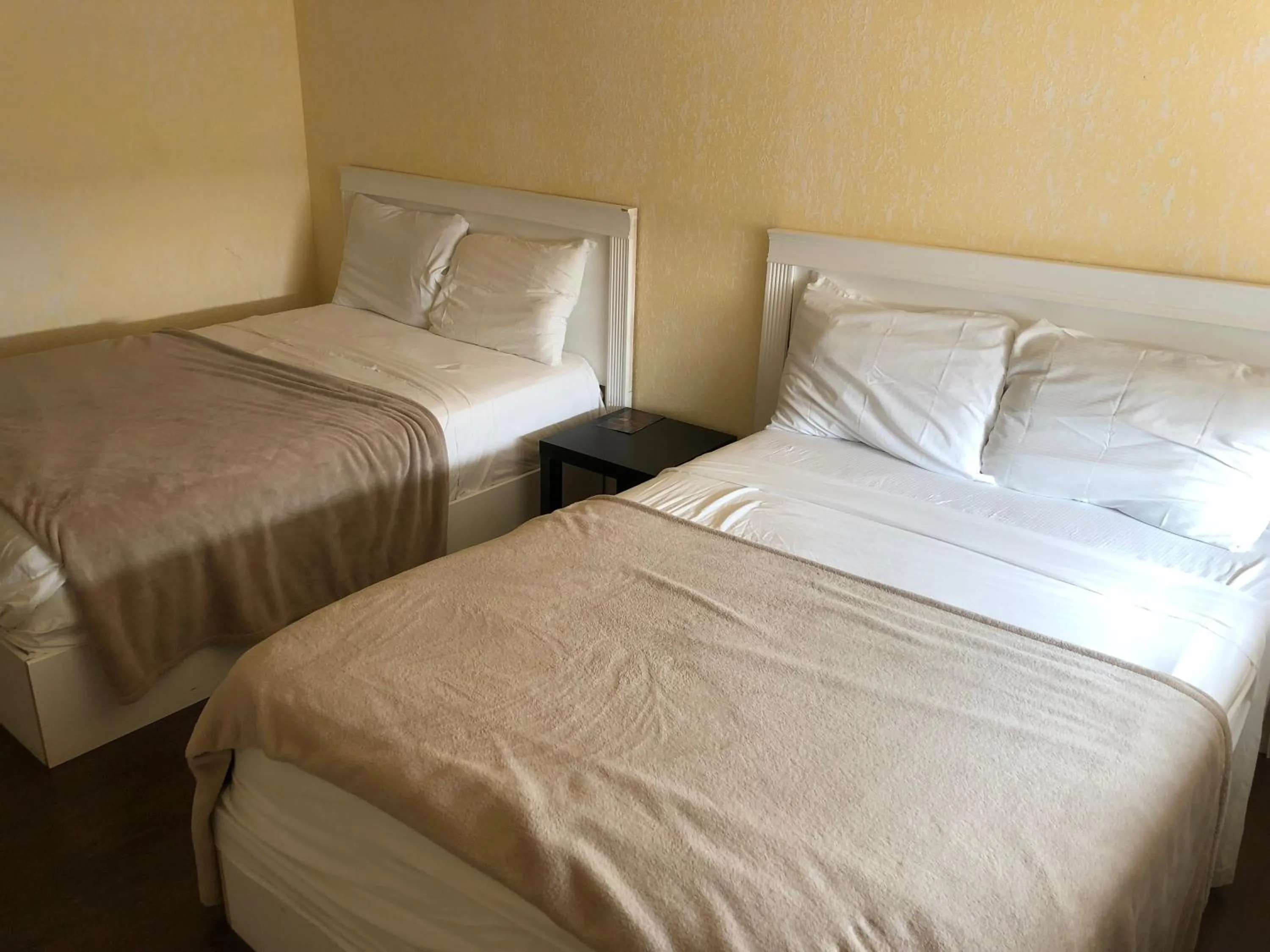 Bed in Langham Motel