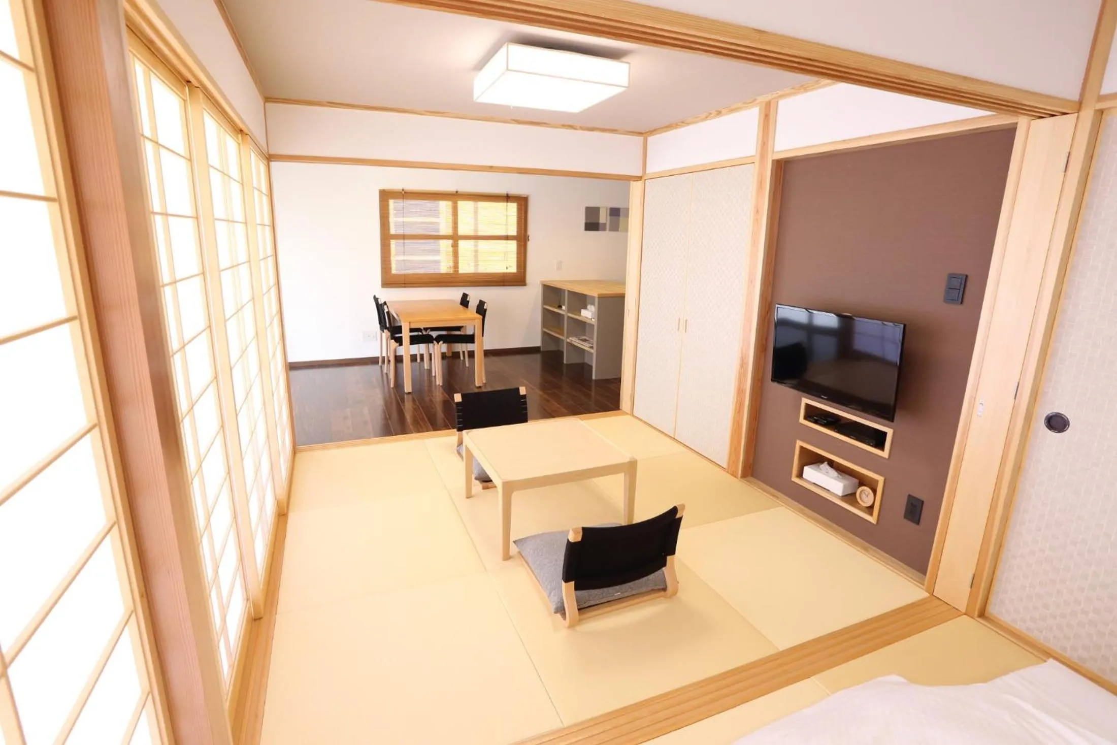Living room in Tabinoteitaku Okinawa Nakijin HOMANN CONCEPT