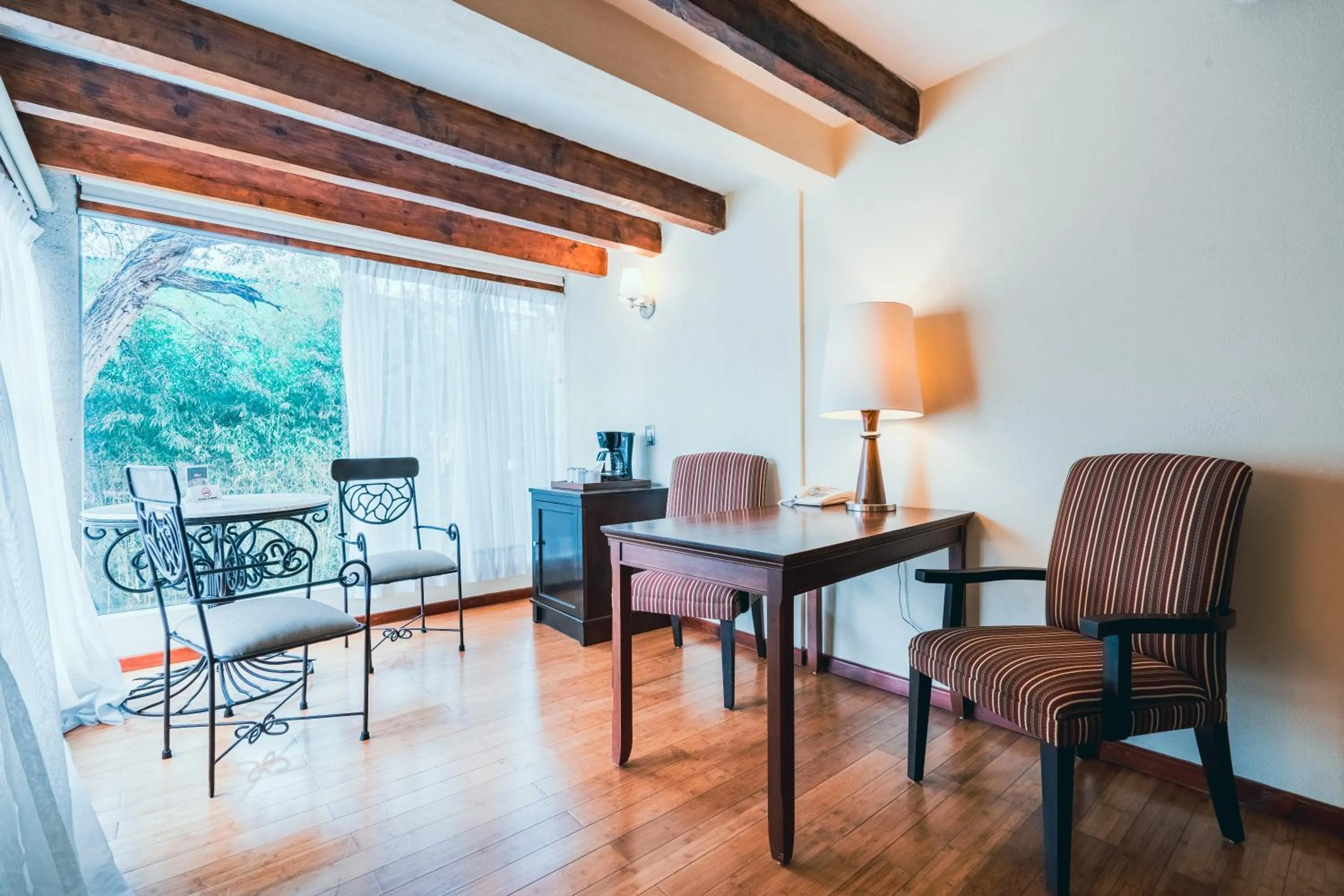 Seating area in Hotel Villa Mercedes San Cristobal