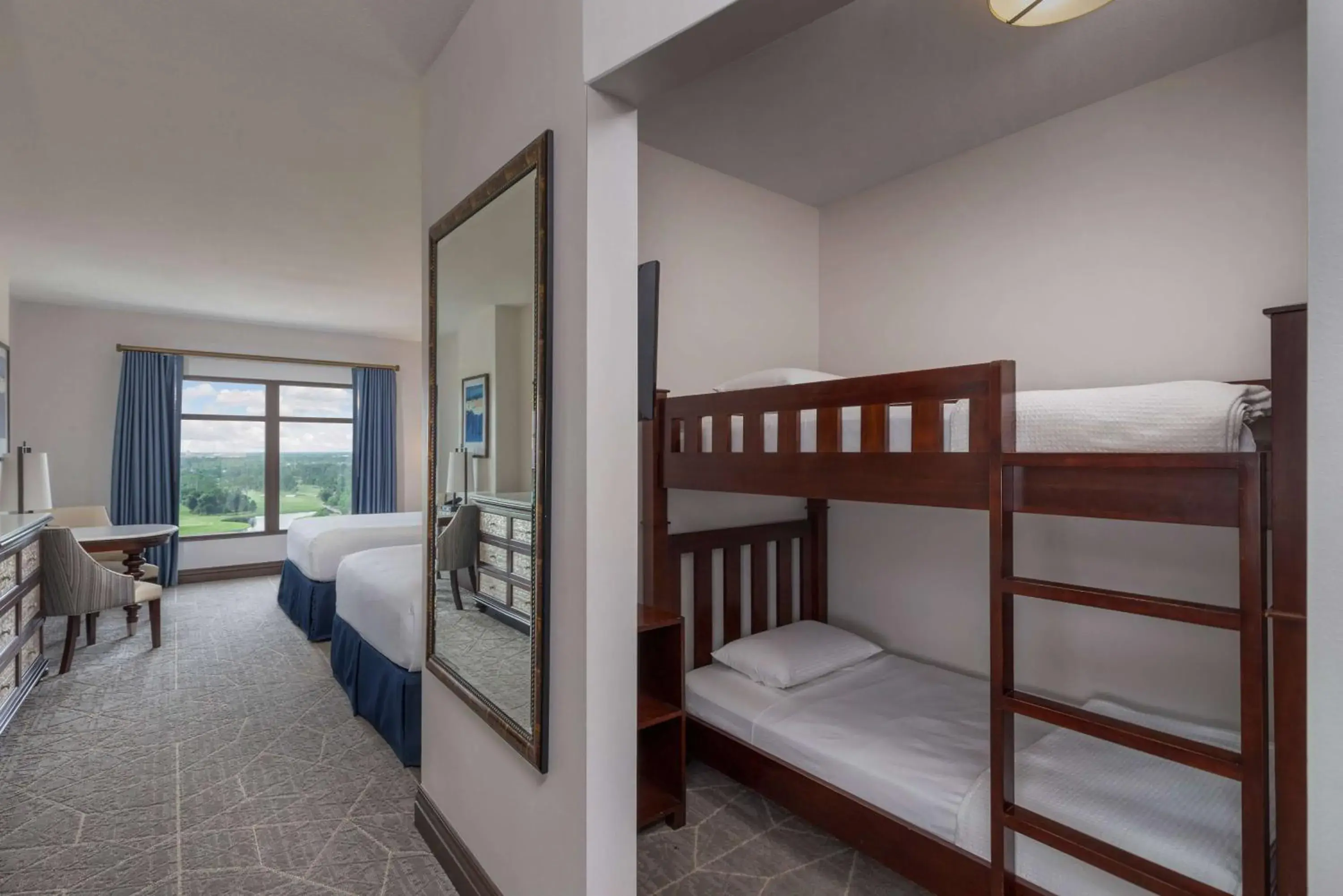 Family Room with Bunk Bed and 2 Queen Beds Non Smoking in Wyndham Grand Orlando Resort Bonnet Creek Family Room with Bunk Bed and 2 Queen Beds Non Smoking in Wyndham Grand Orlando Resort Bonnet Creek