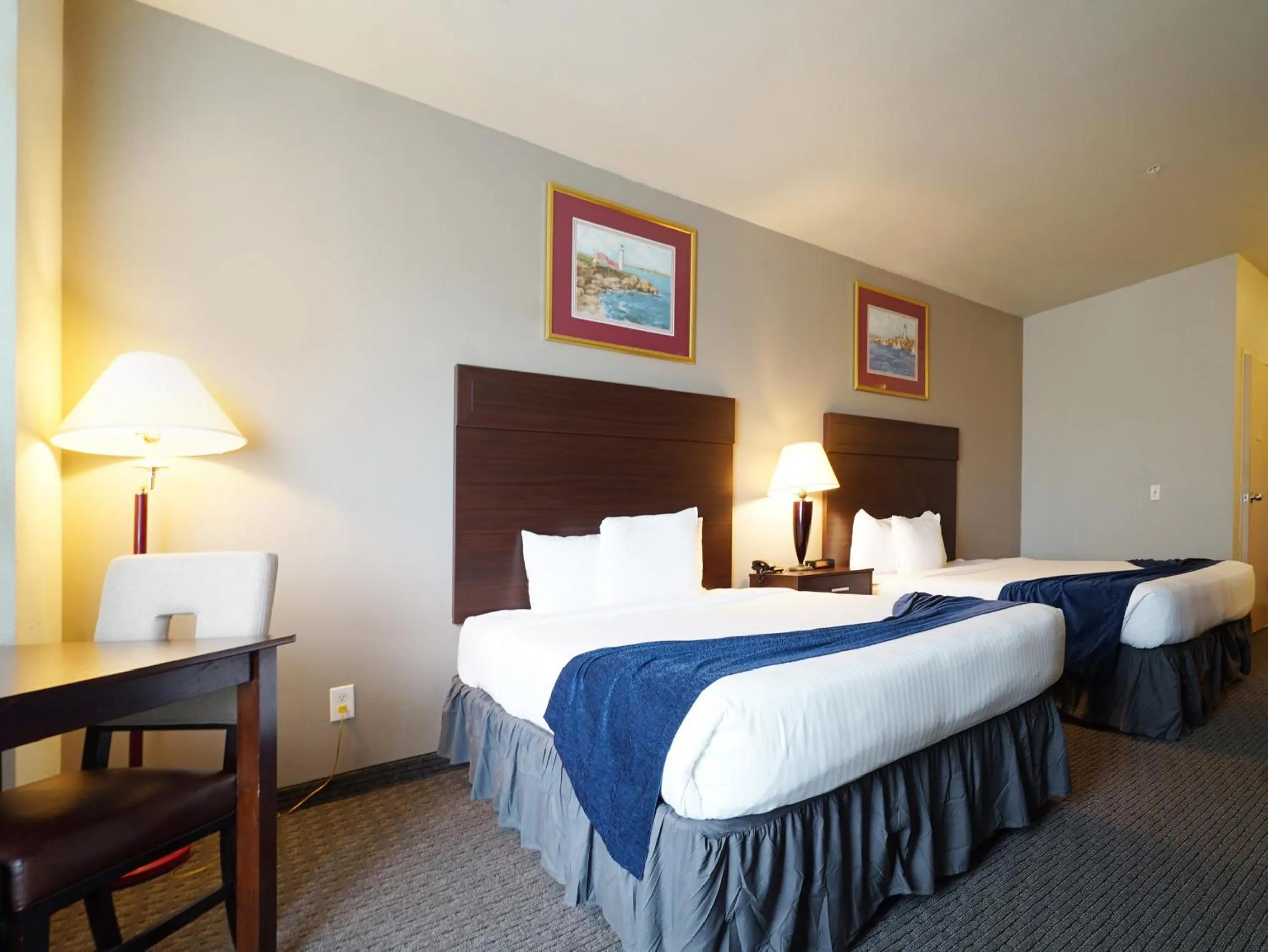 Bed in BayVue Hotel, Resort & Suites